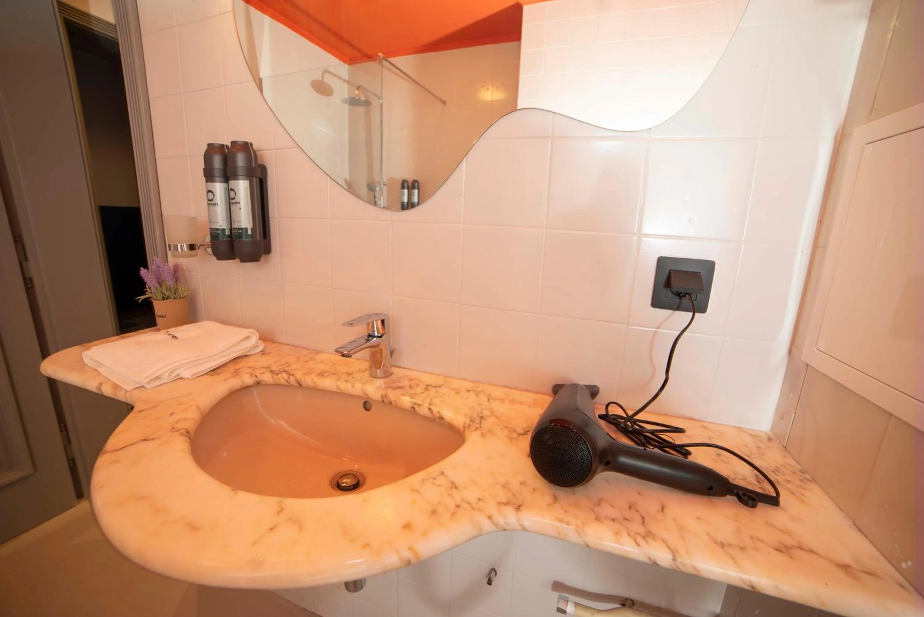 Bathroom in Maria Luisa by INTROVERT HOTELS