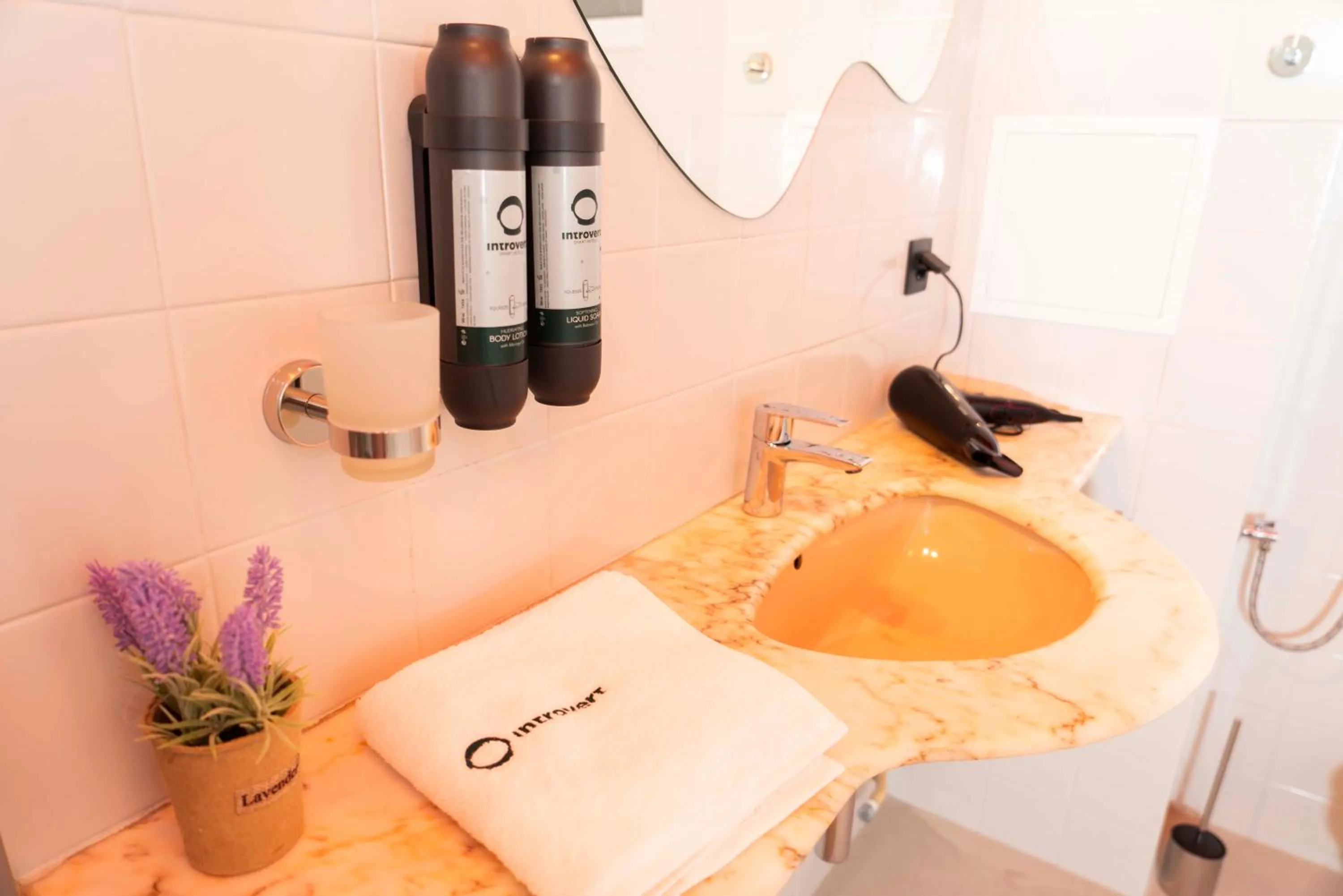 Bathroom in Maria Luisa by INTROVERT HOTELS