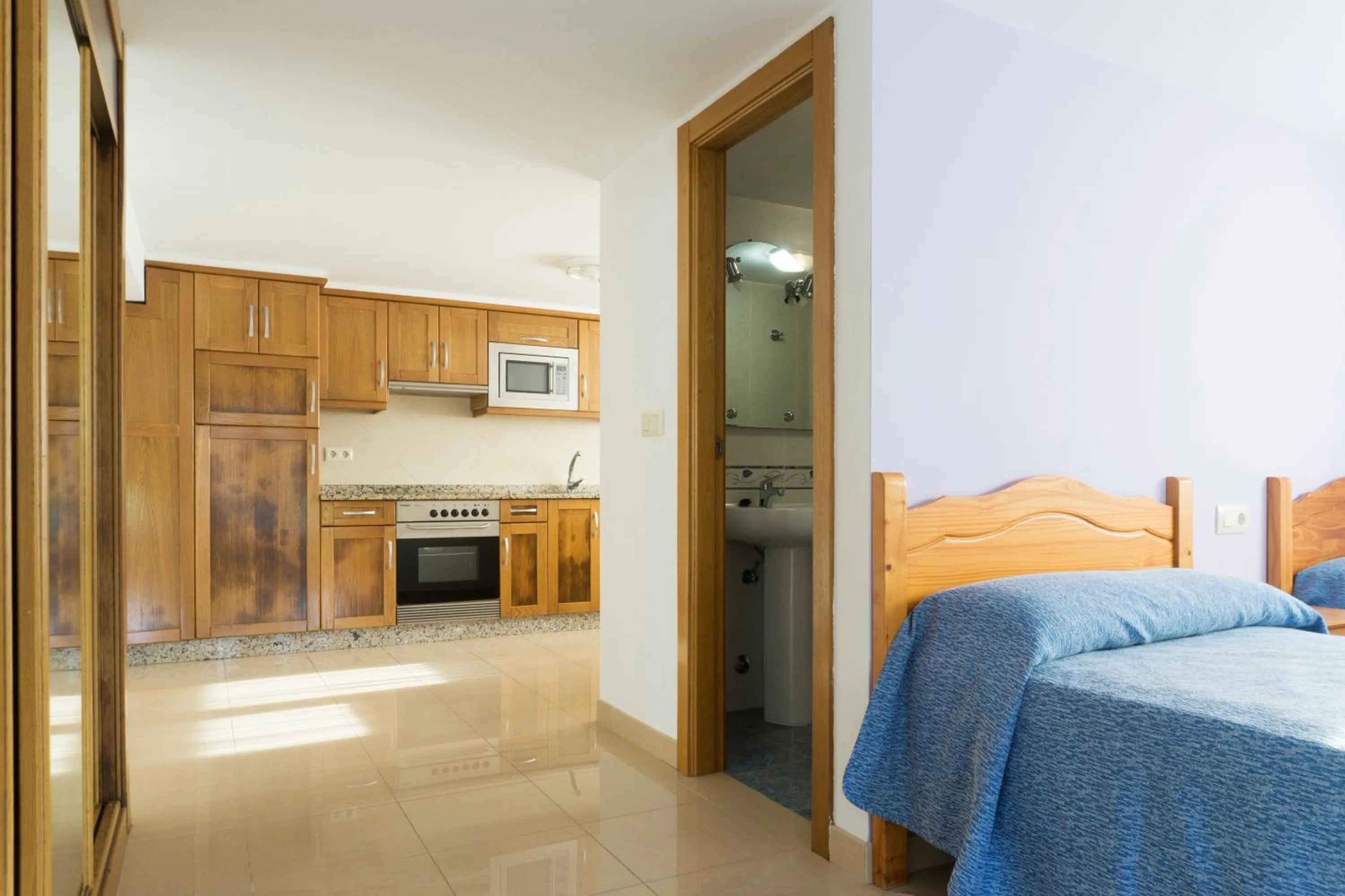 Kitchen or kitchenette, Bed in Casa Codesal Apartamentos