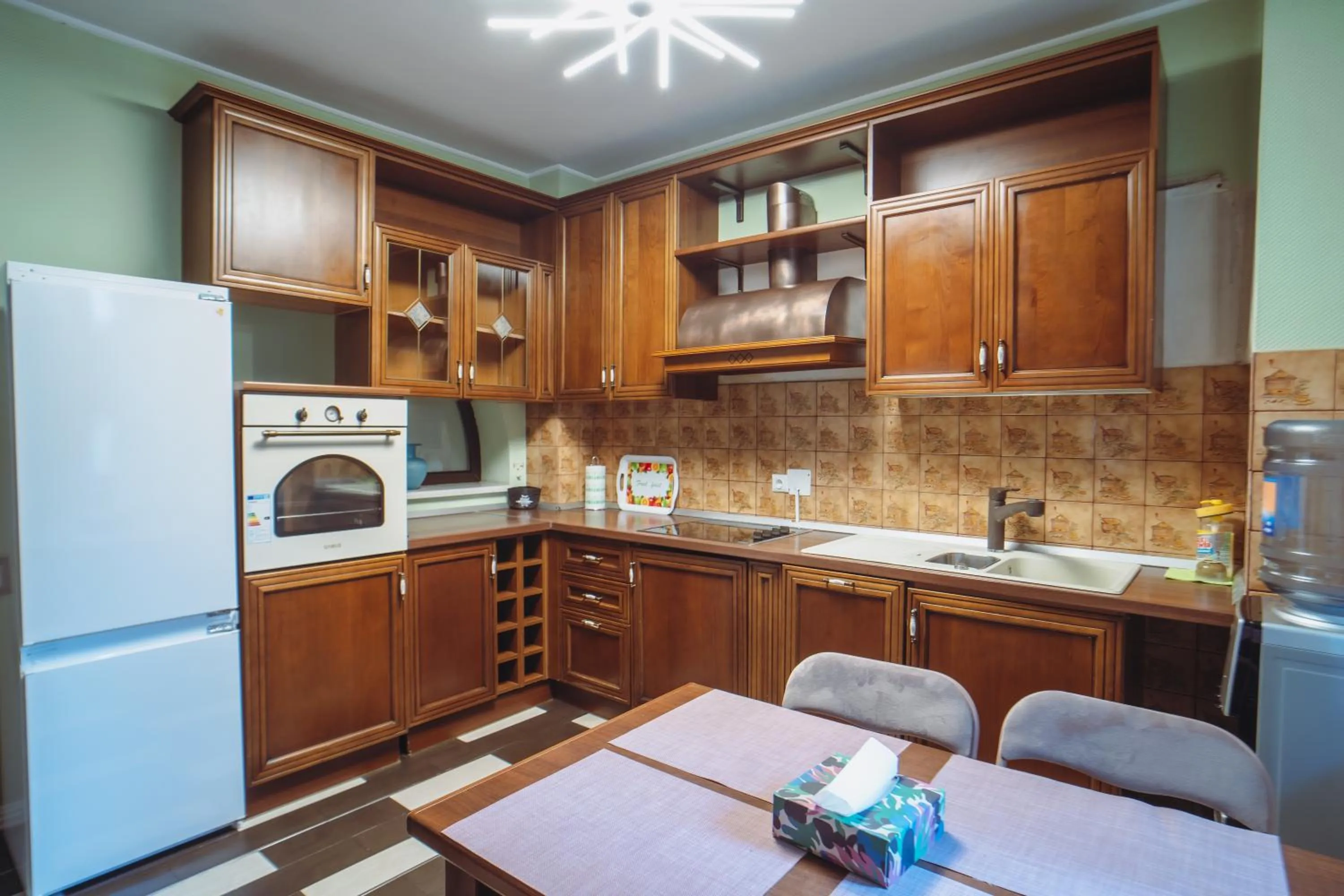 Kitchen or kitchenette in Luxuria Central Villa Bucharest