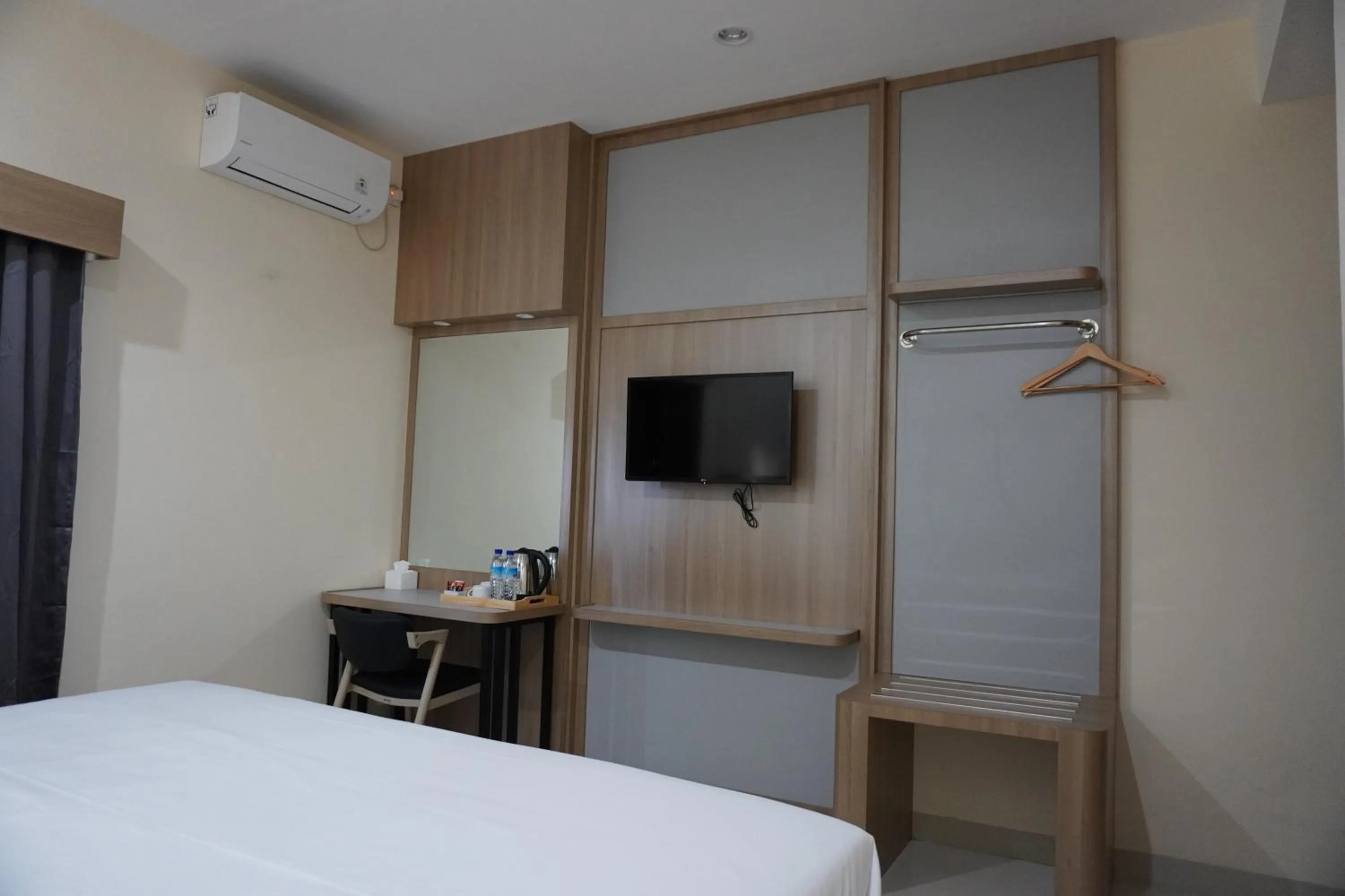 TV and multimedia, Bed in Hotel Luansa Klui