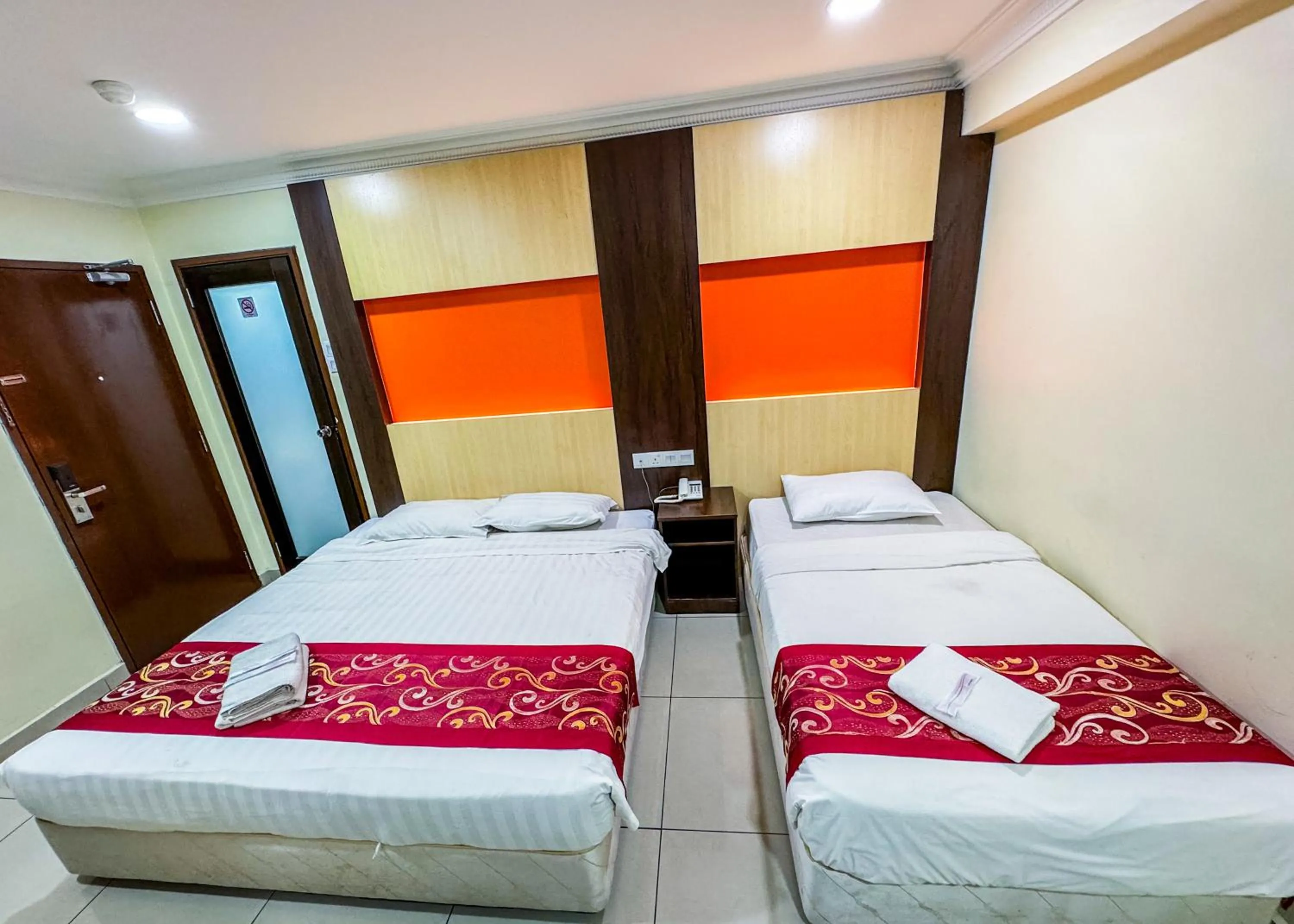 Bed in THE STARION HOTEL BUKIT BINTANG