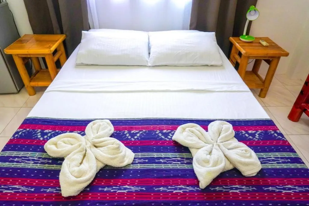 Bed in Baki Divers and Beach Resort