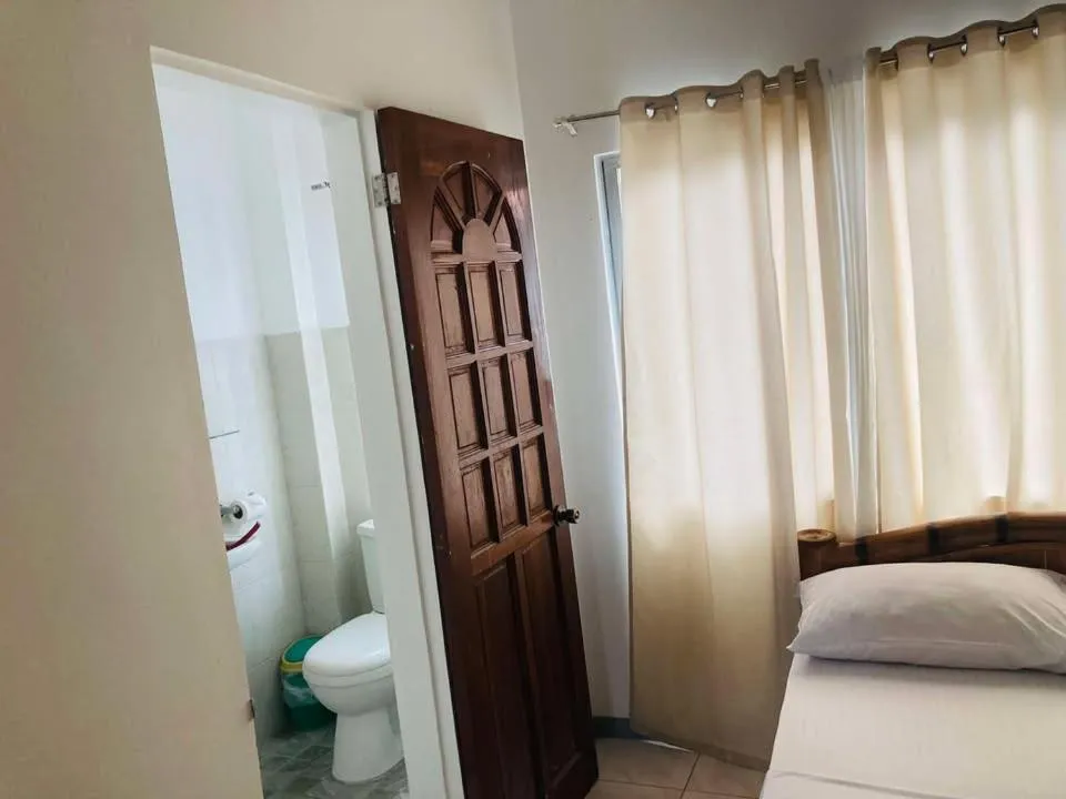 Bed in Baki Divers and Beach Resort