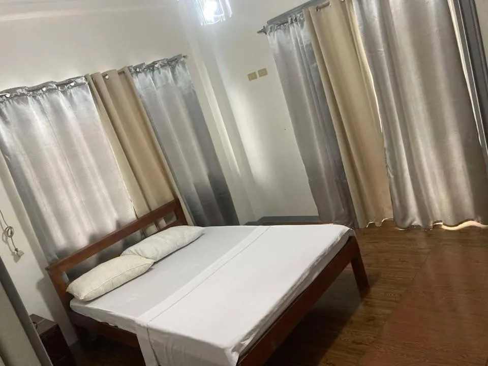 Bed in Baki Divers and Beach Resort