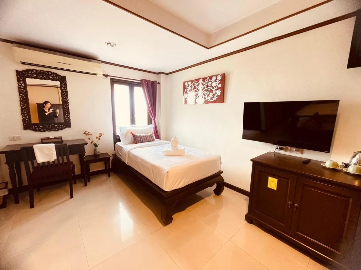 Bed in Na Thapae Chiangmai Hotel