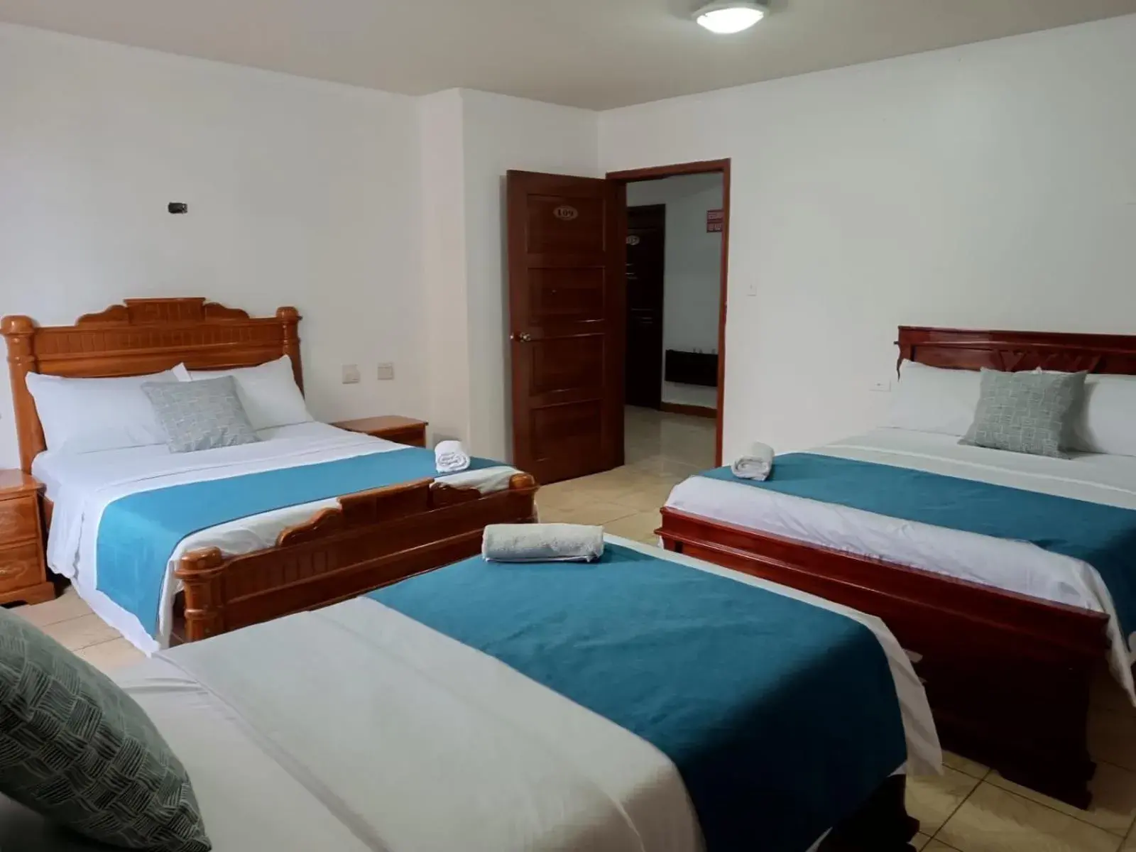 Triple Room in Hostal Bicentenario Triple Room in Hostal Bicentenario