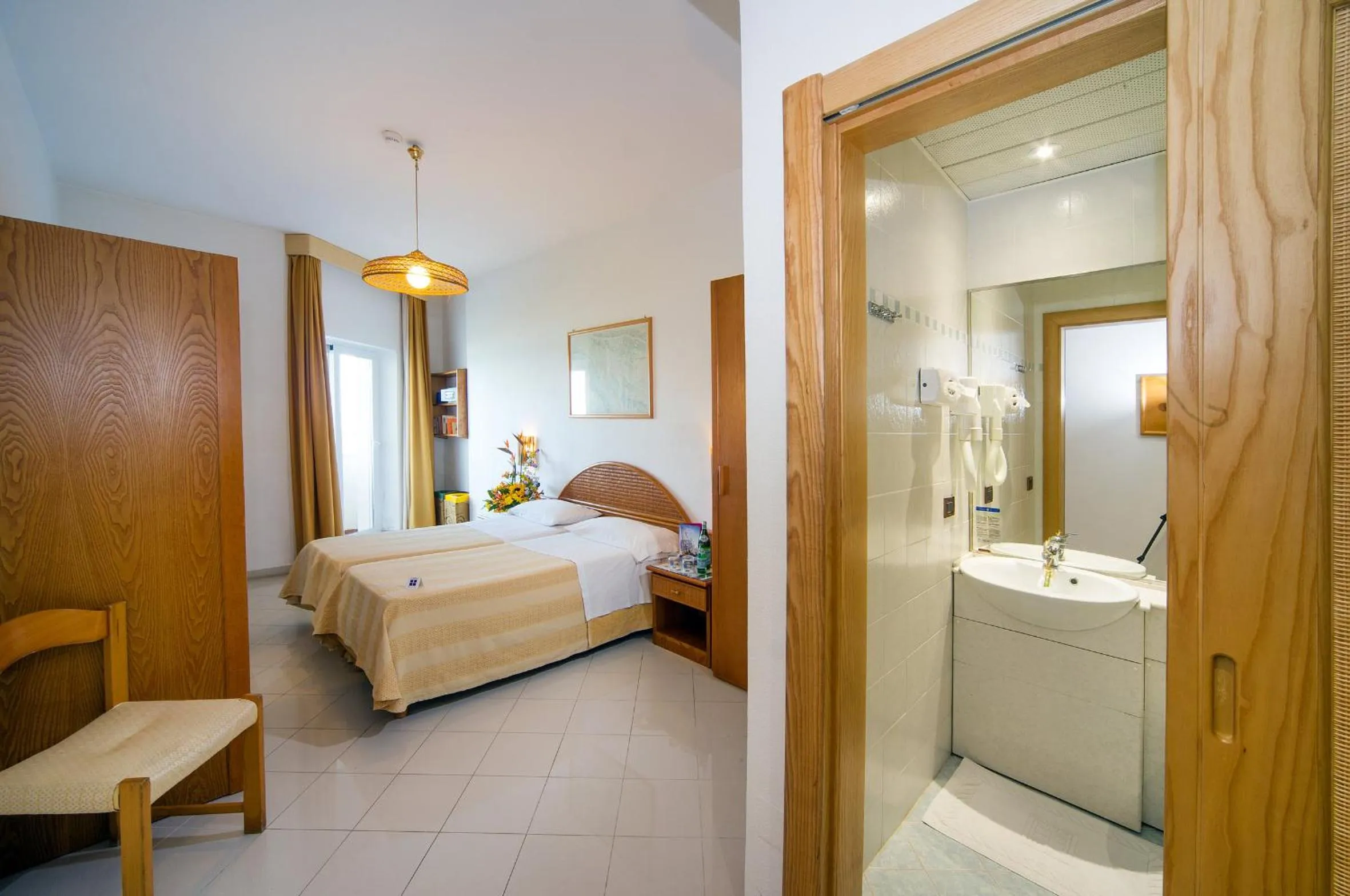 Photo of the whole room, Bed in Ecoresort Le Sirene - Caroli Hotels