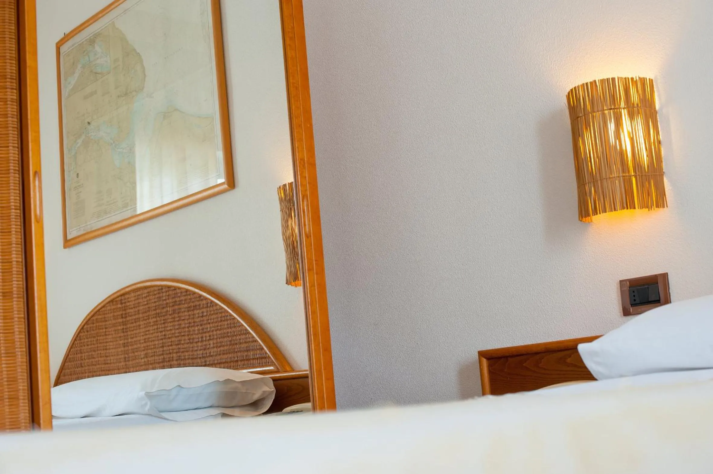 Decorative detail, Bed in Ecoresort Le Sirene - Caroli Hotels