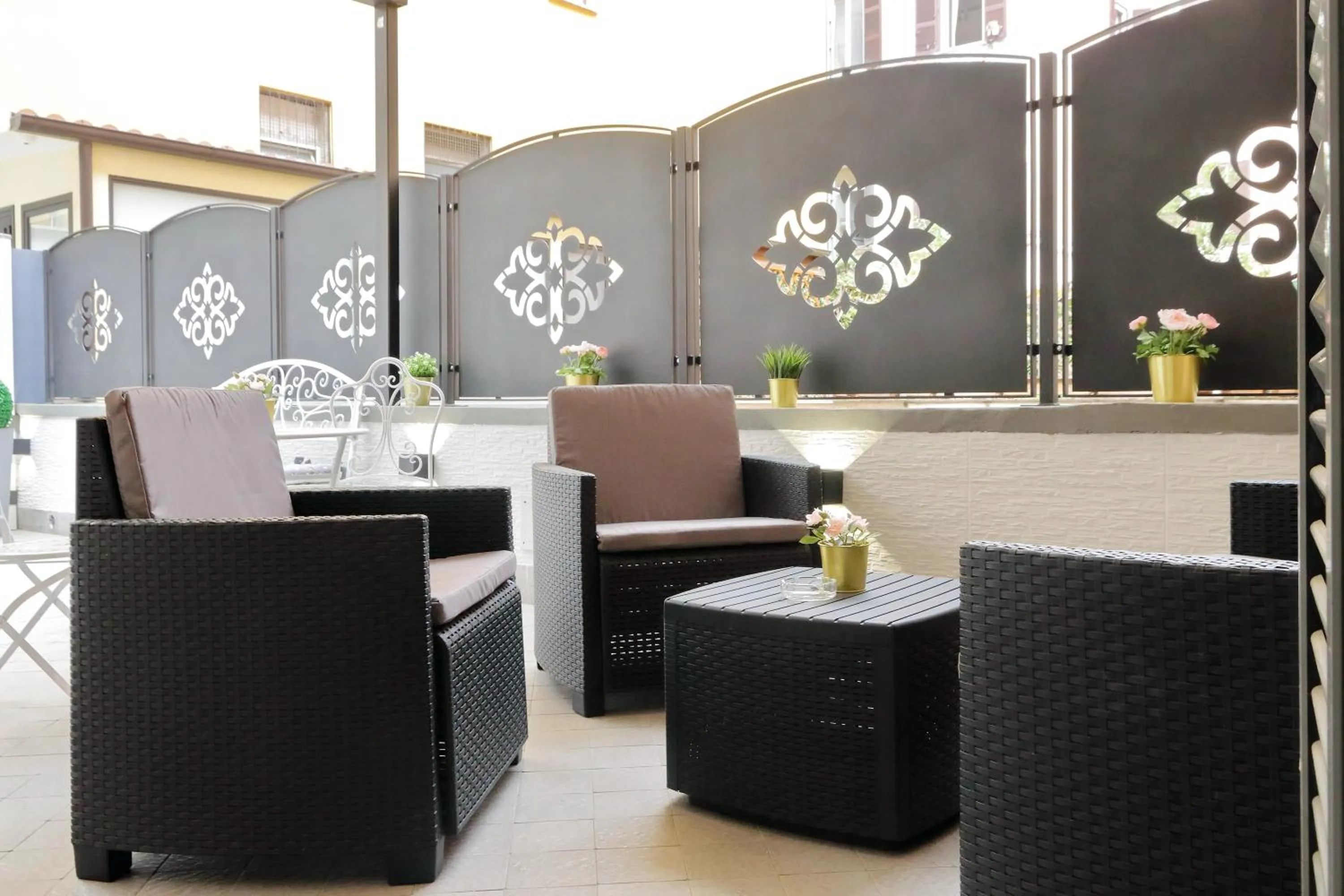 Patio in Roman Holiday Suites