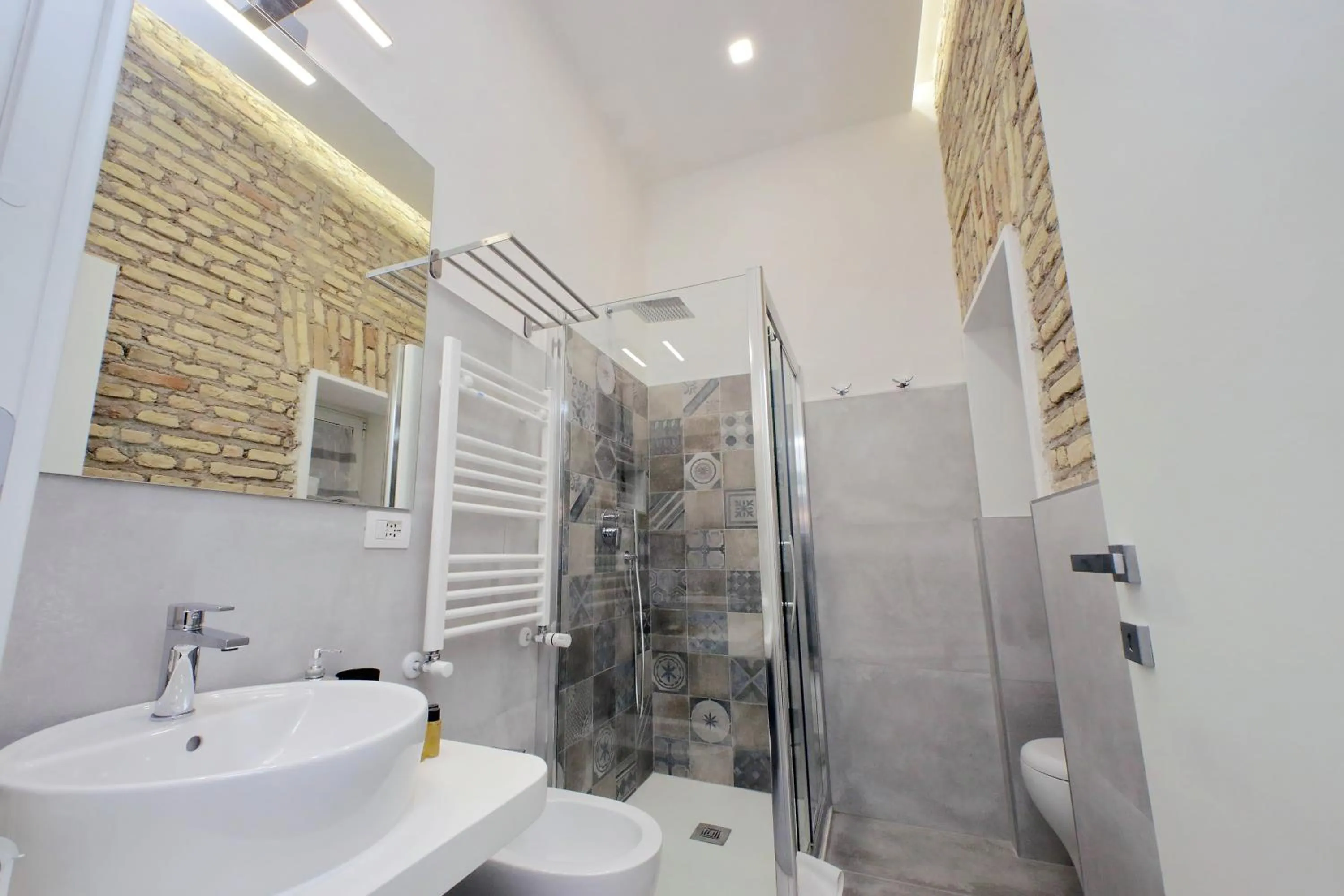 Shower in Roman Holiday Suites