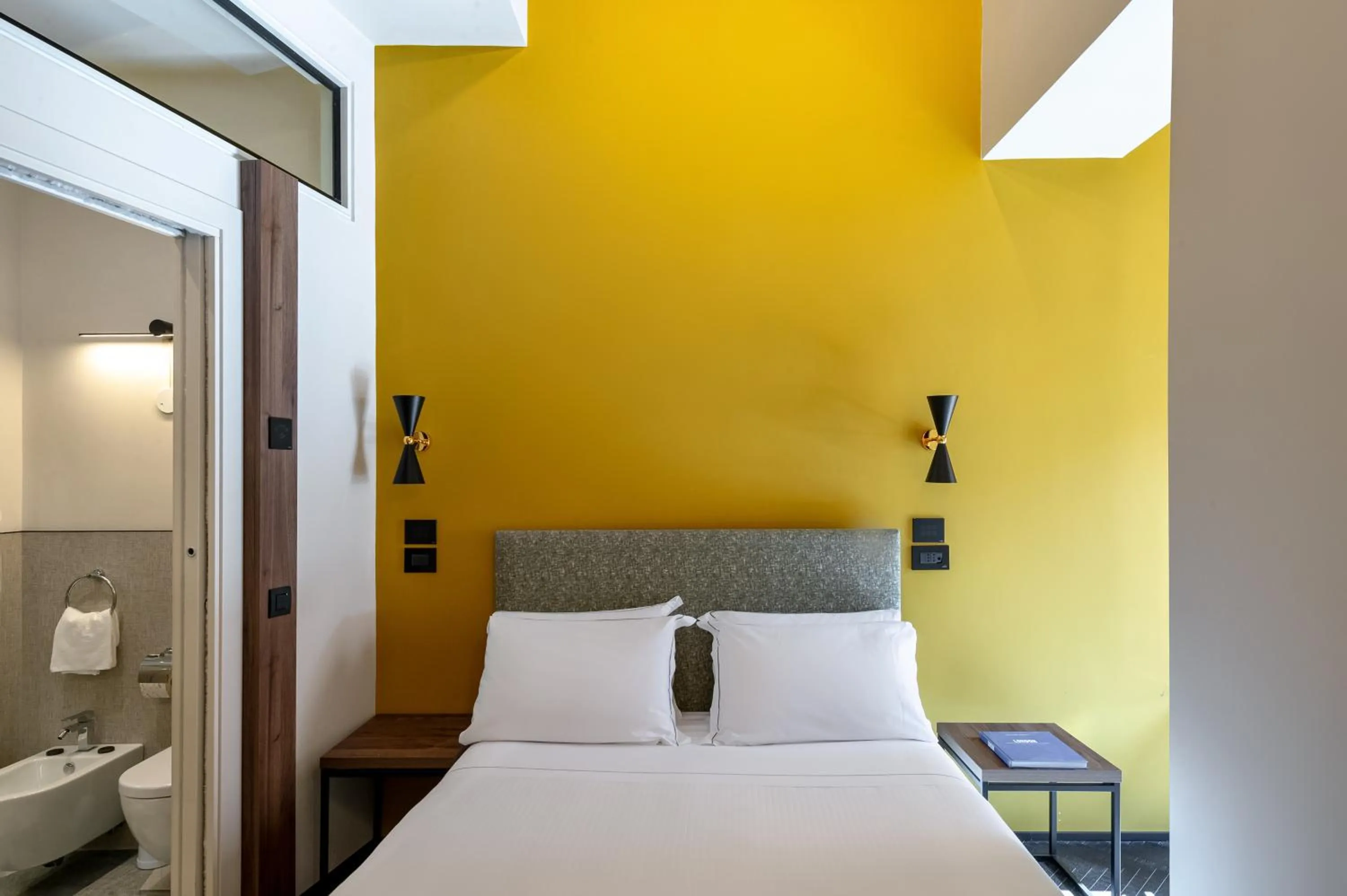 Bed in Passpartout Boutique Palace