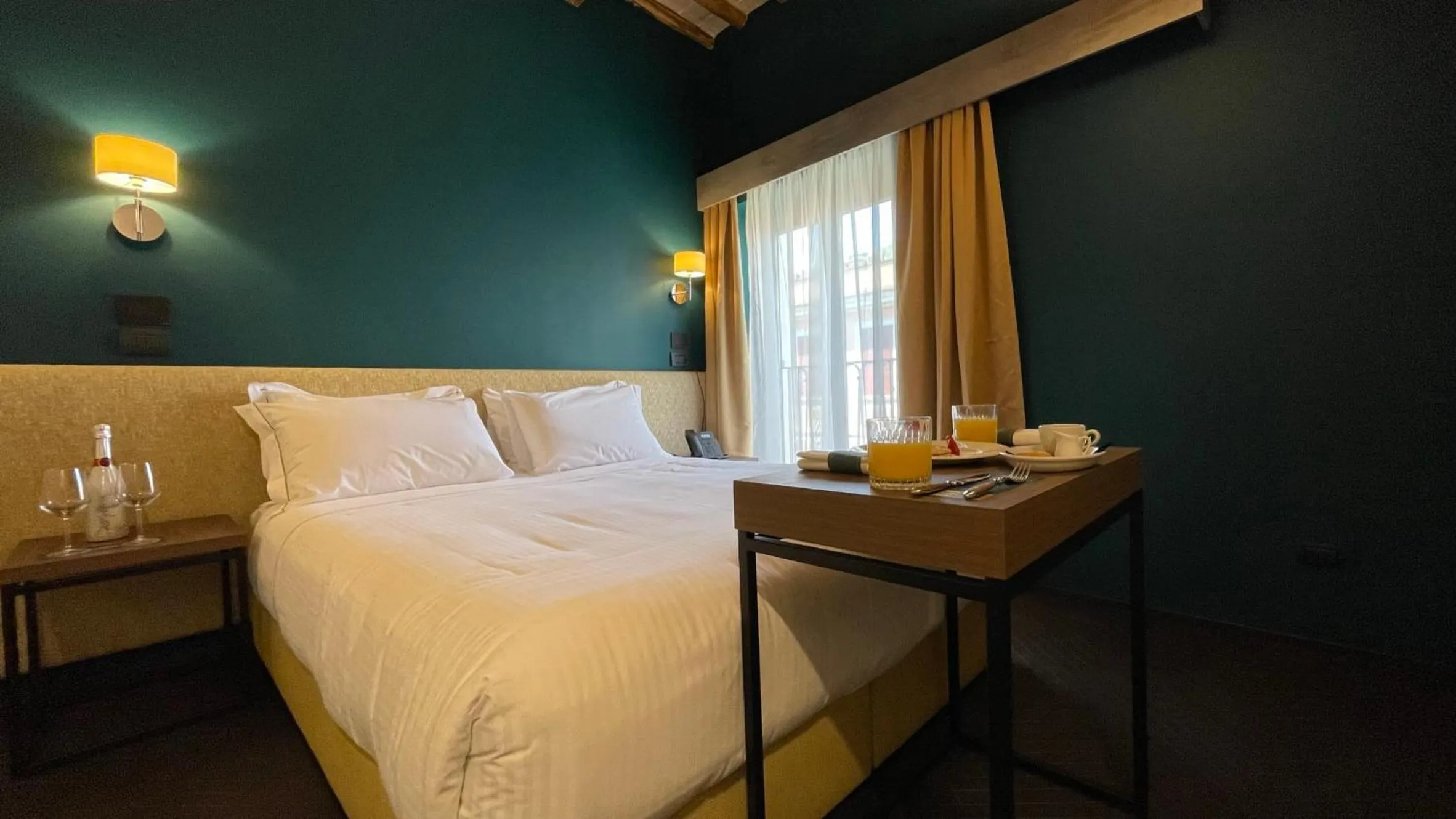 Bed in Passpartout Boutique Palace