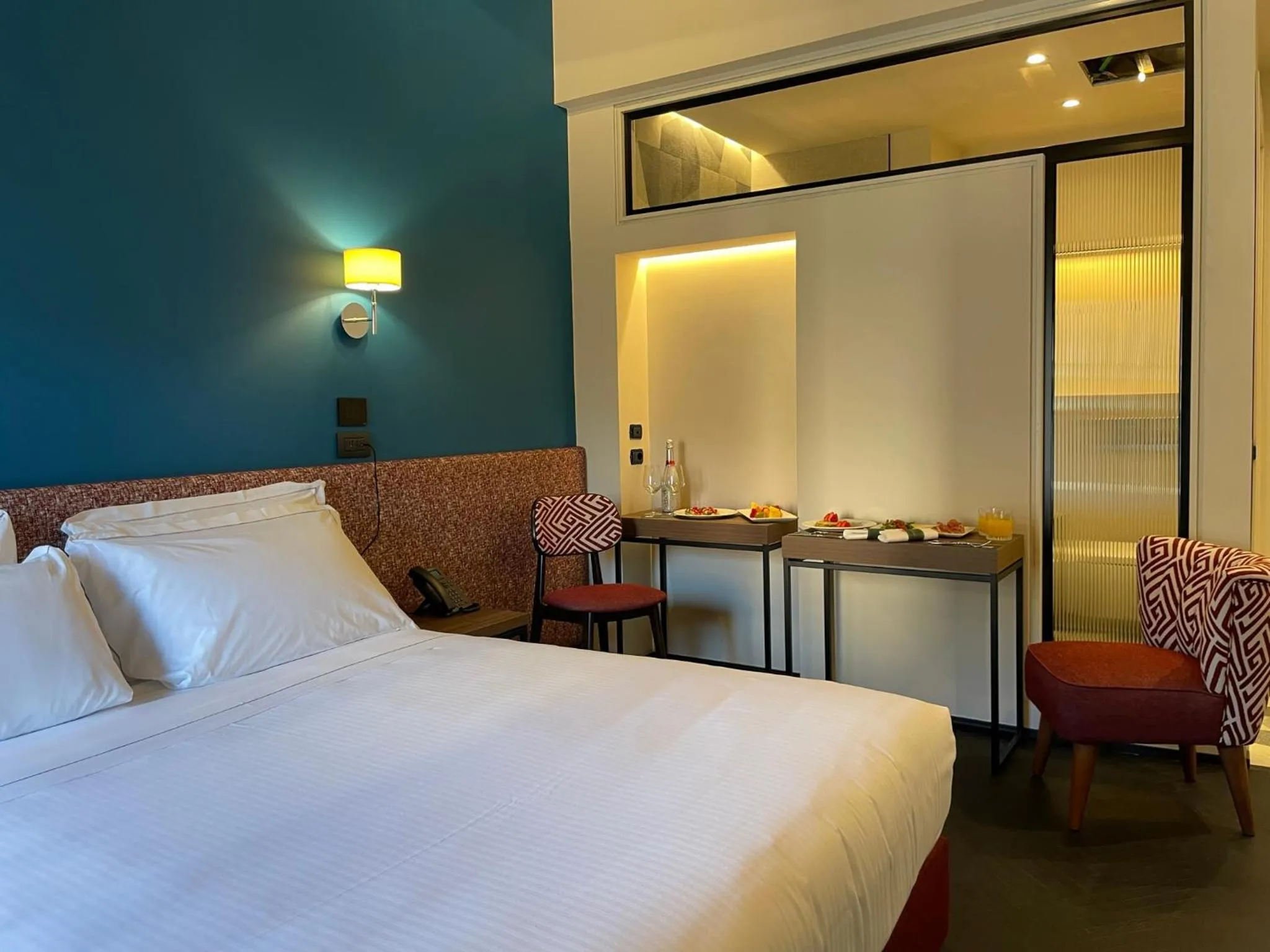 Bed in Passpartout Boutique Palace