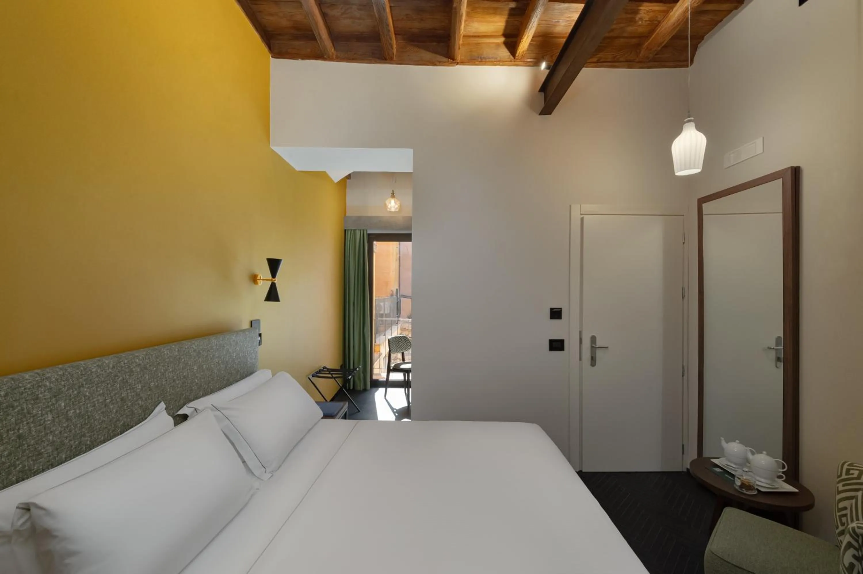 Bed in Passpartout Boutique Palace