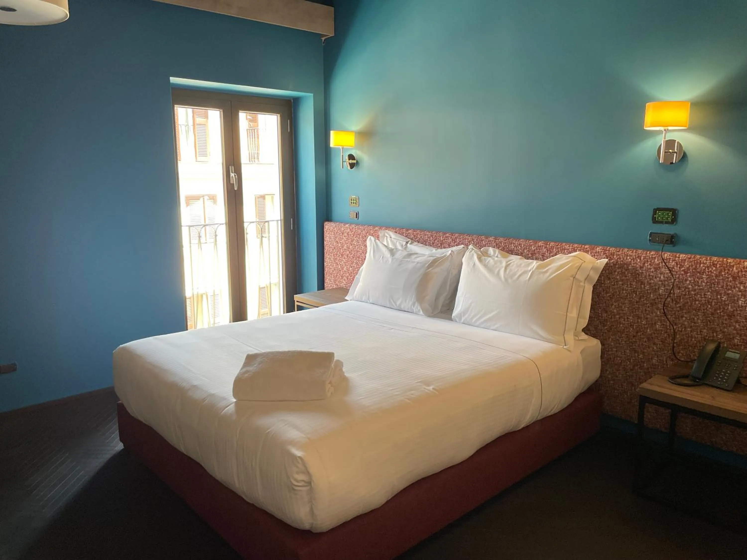 Bed in Passpartout Boutique Palace