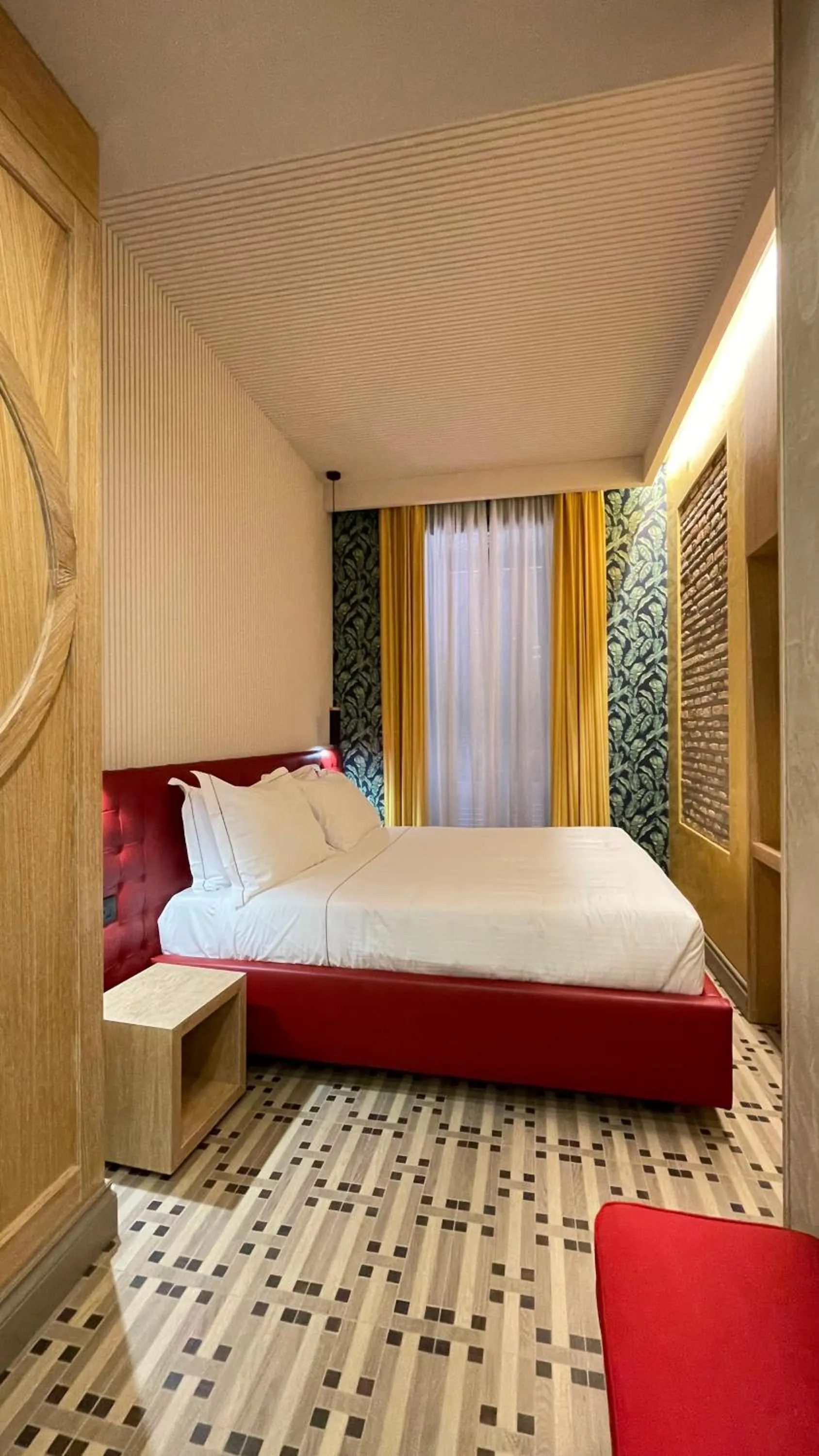 Bed in Passpartout Boutique Palace