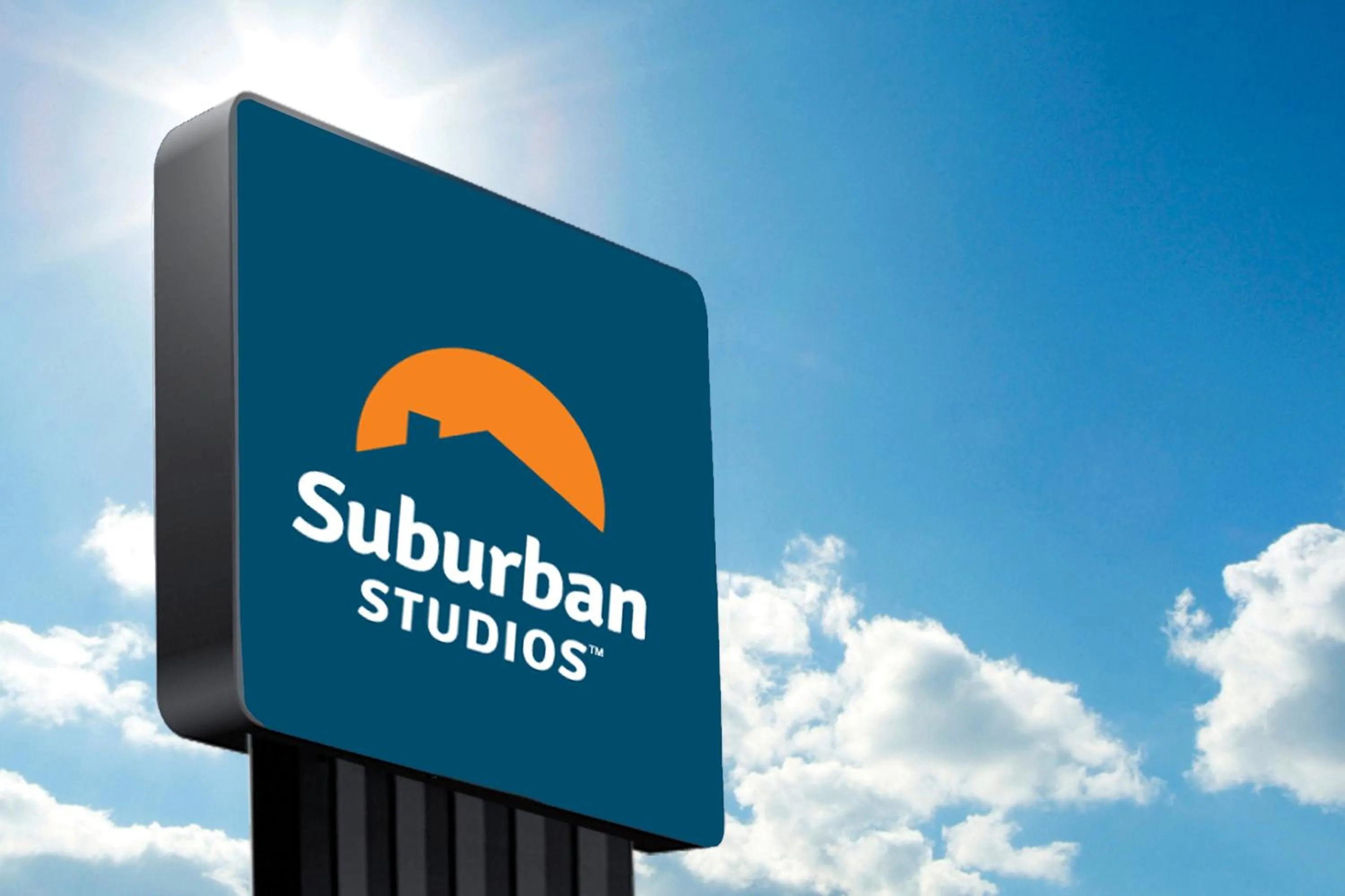 Property logo or sign in Suburban Studios Canon City