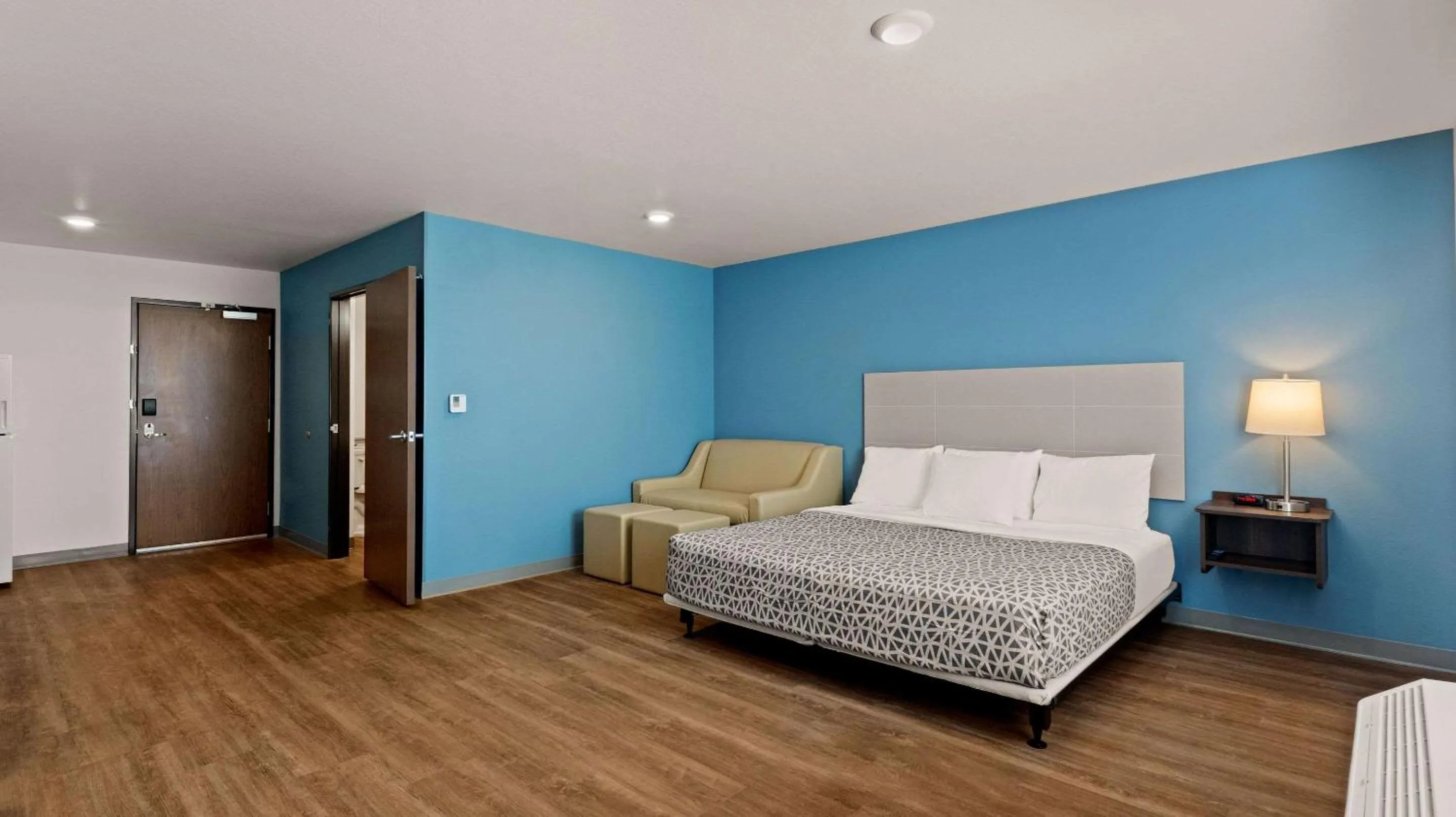 Bedroom, Bed in WoodSpring Suites Greeley