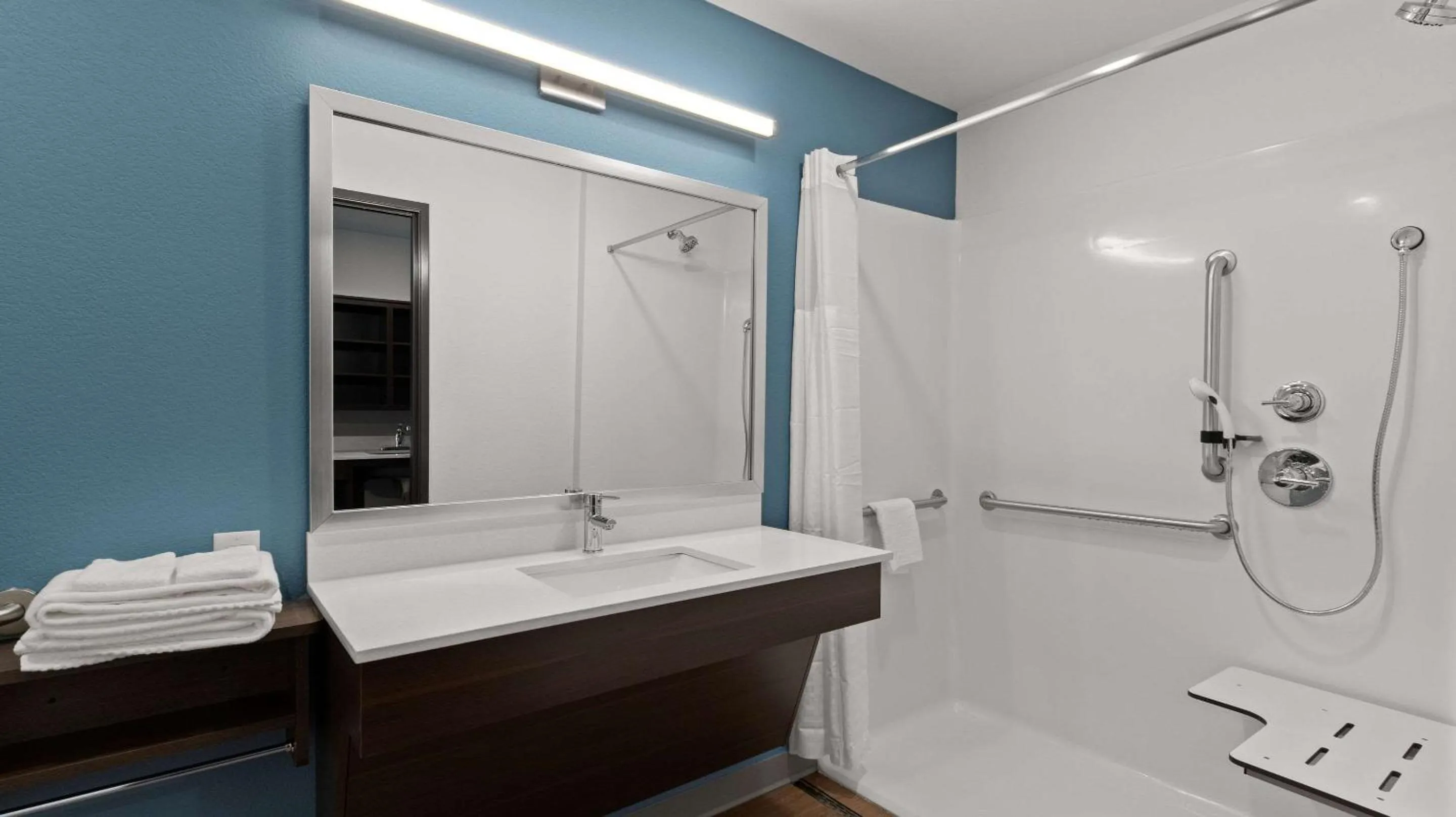 Bathroom in WoodSpring Suites Greeley