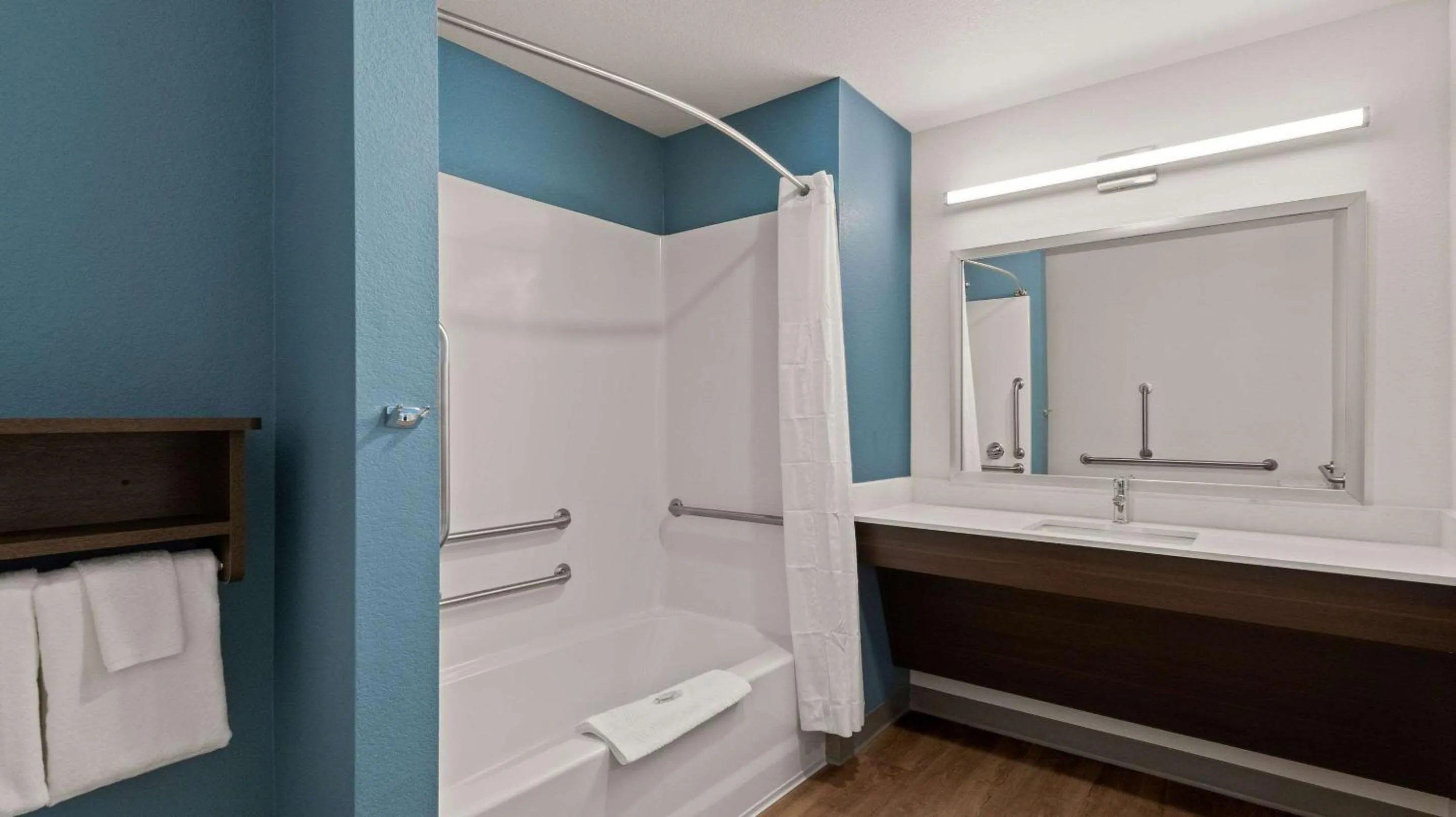 Bathroom in WoodSpring Suites Greeley