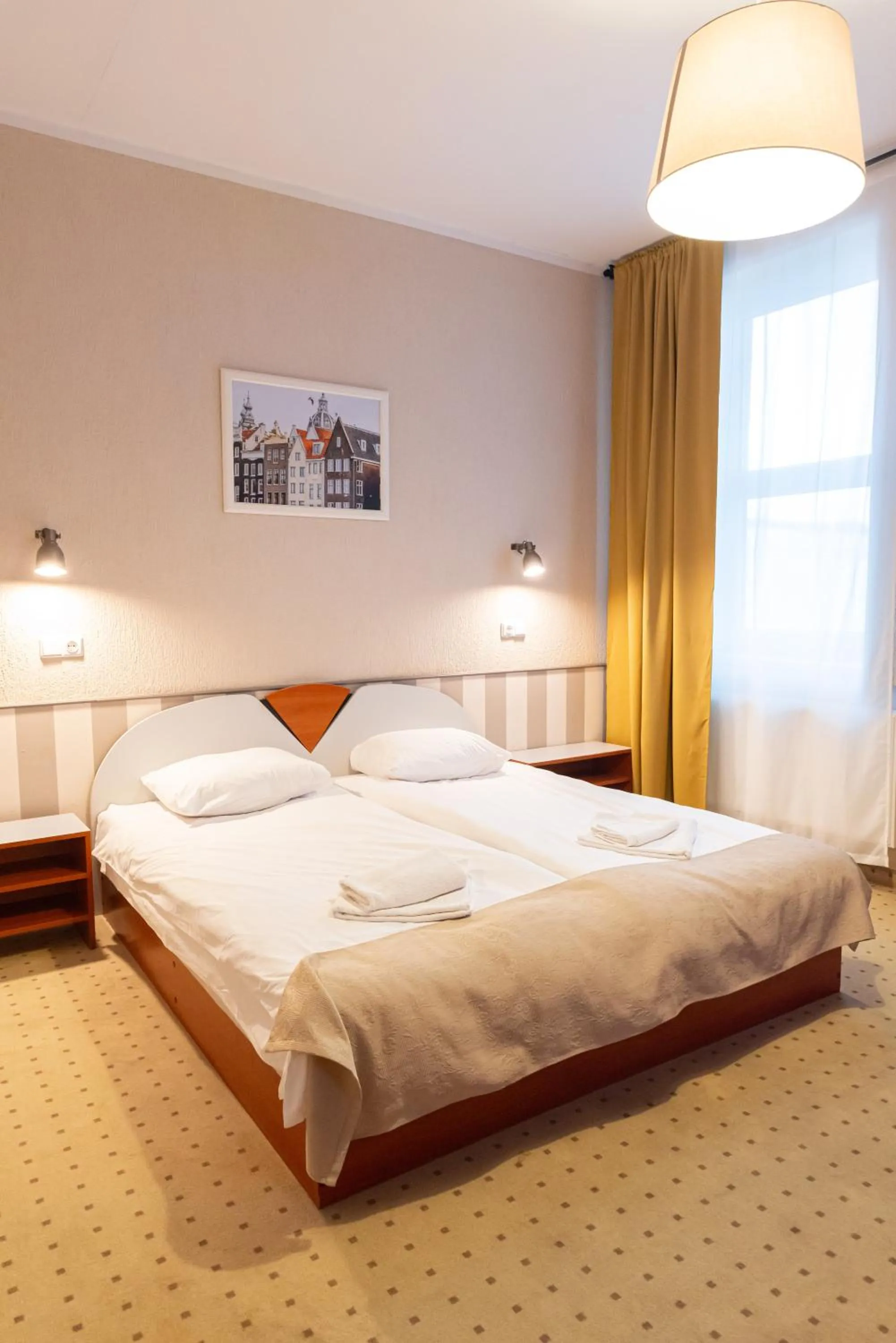 Bed in Inza Guest House