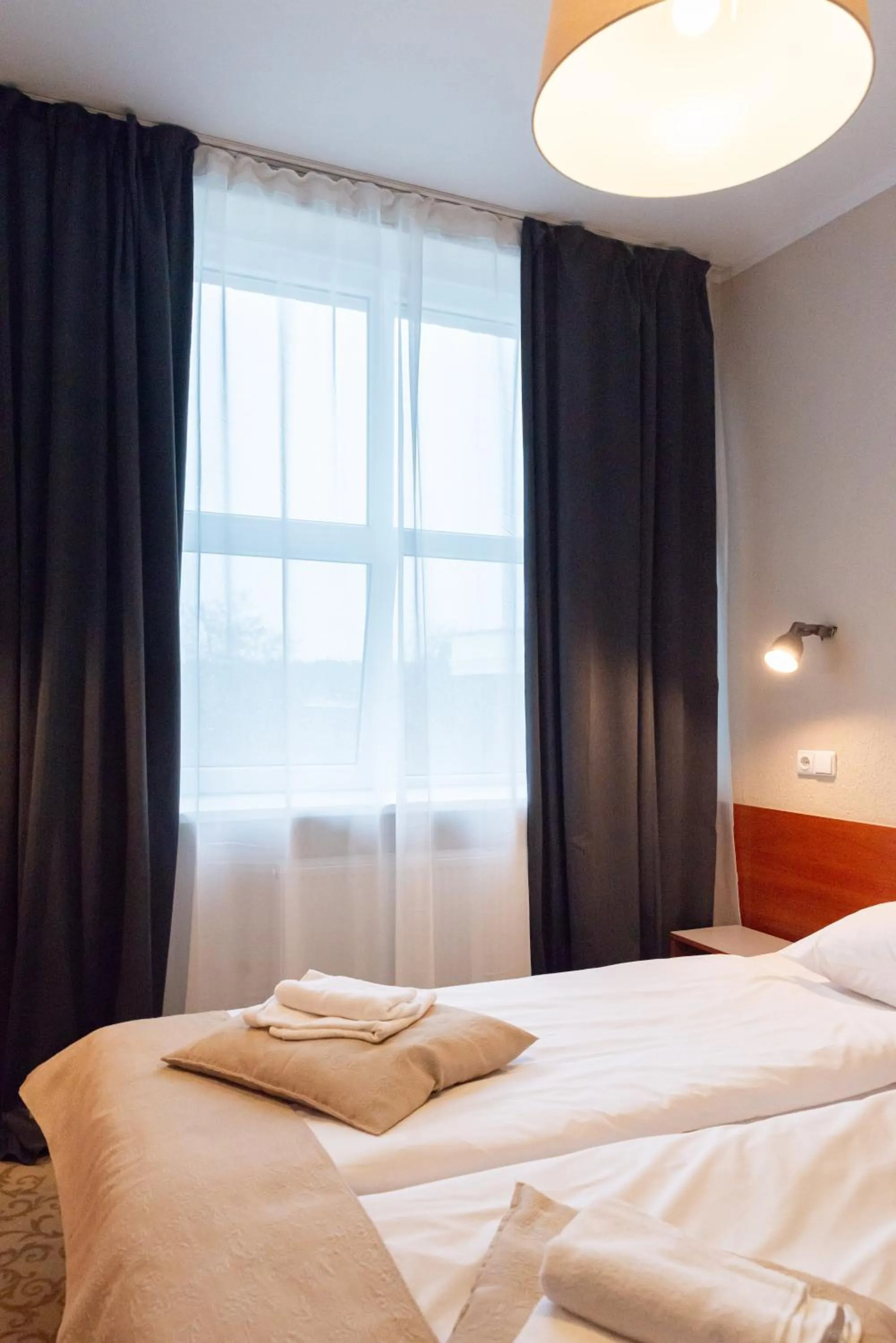 Bed in Inza Guest House