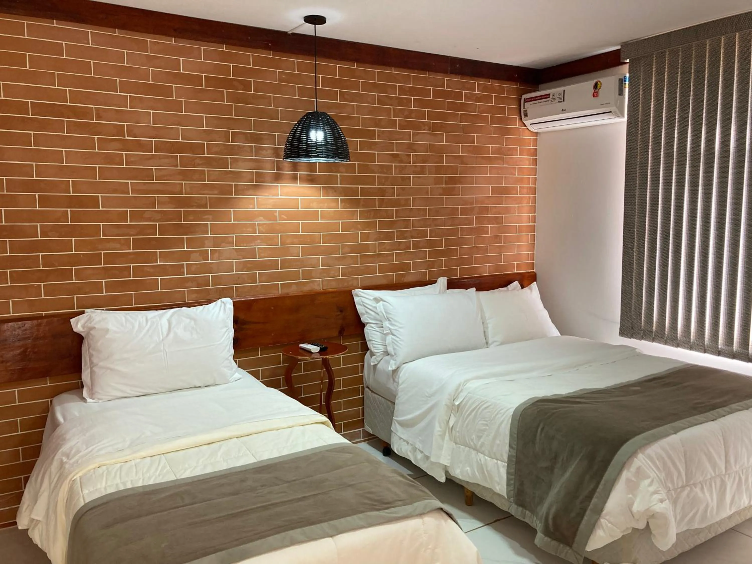 Bedroom, Bed in Hotel Senador Distributed by Ameris - Quedas do Iguaçu - Paraná