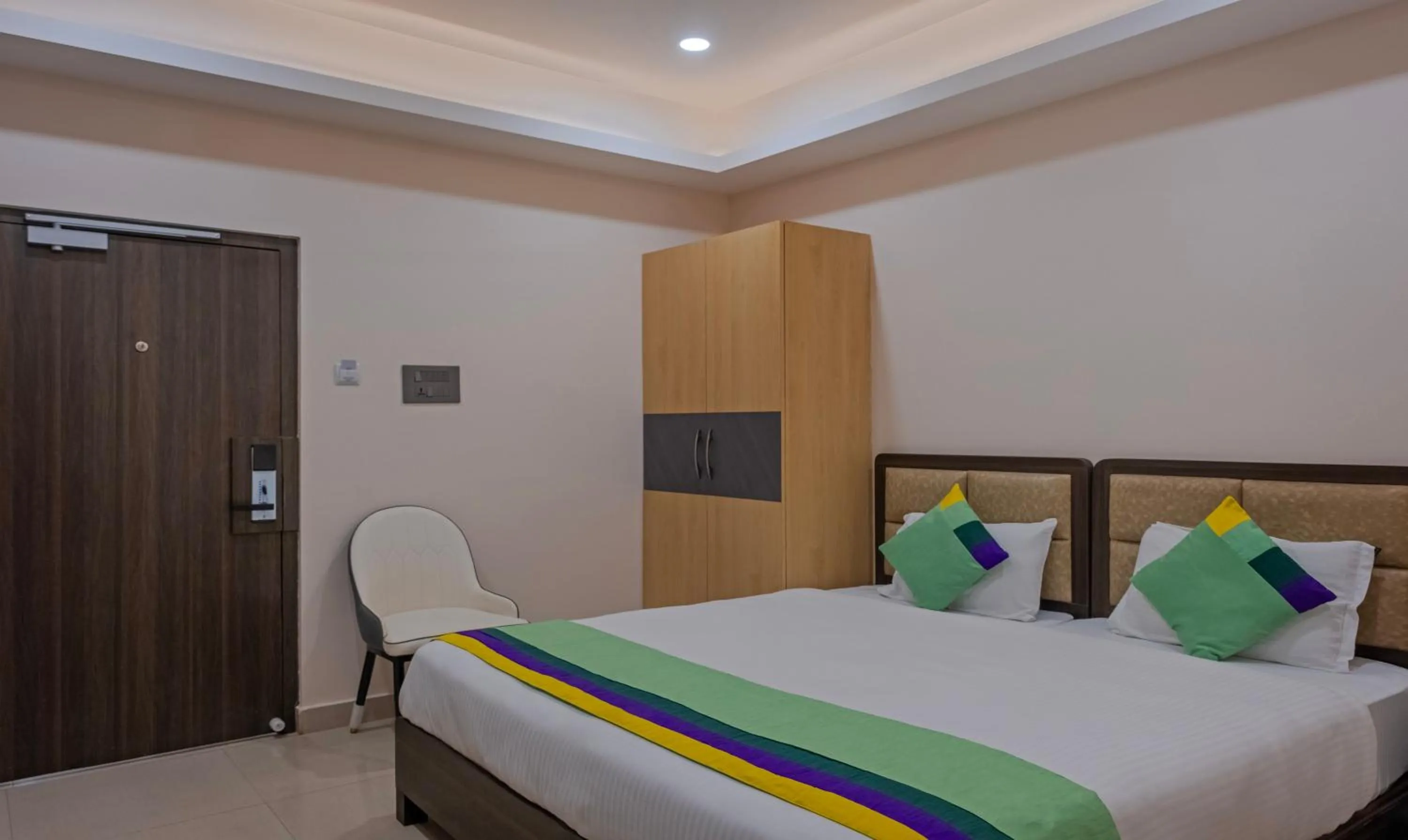 Bed in Treebo Su Casa Grand