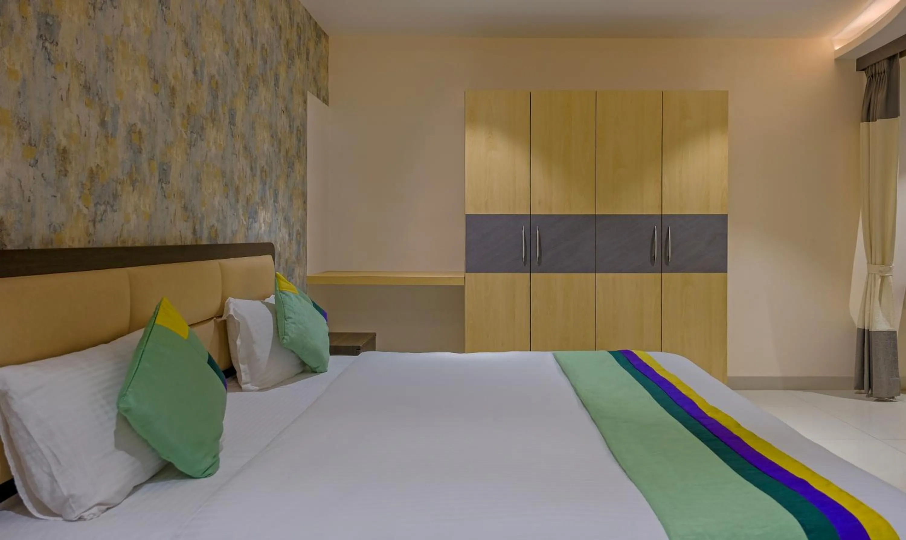 Bed in Treebo Su Casa Grand