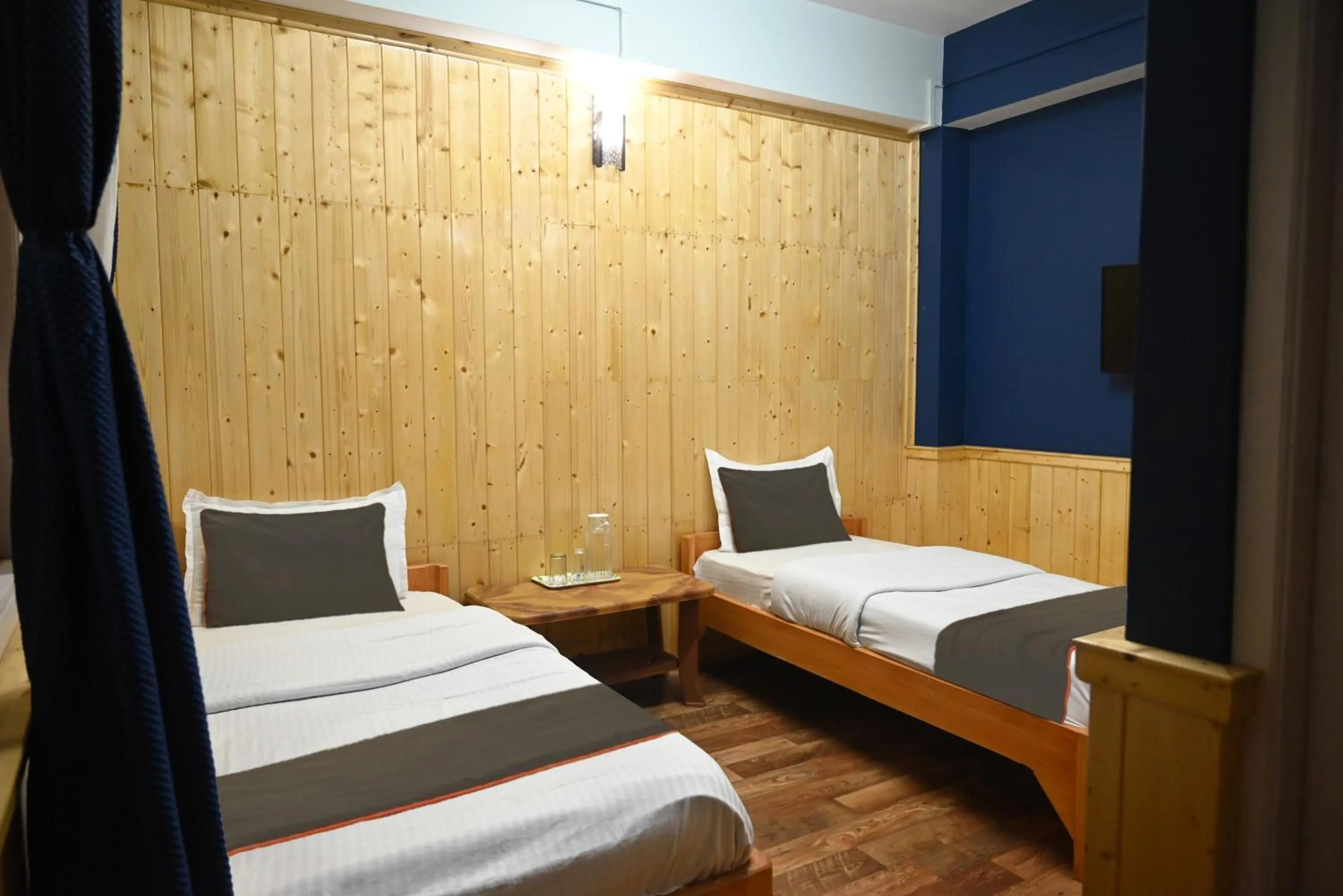 Bedroom in Hotel O Kaizen Residency