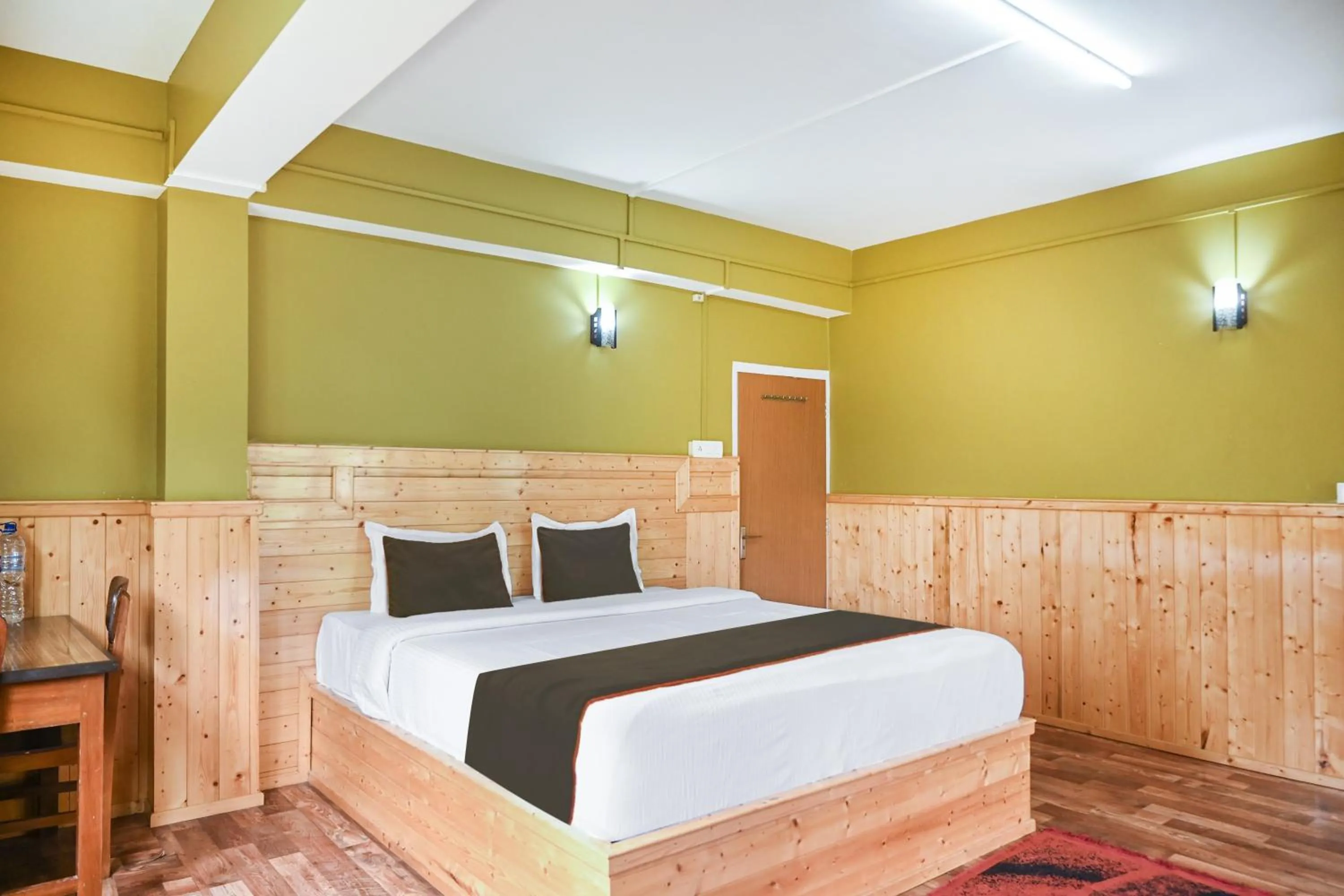 Bedroom in Hotel O Kaizen Residency