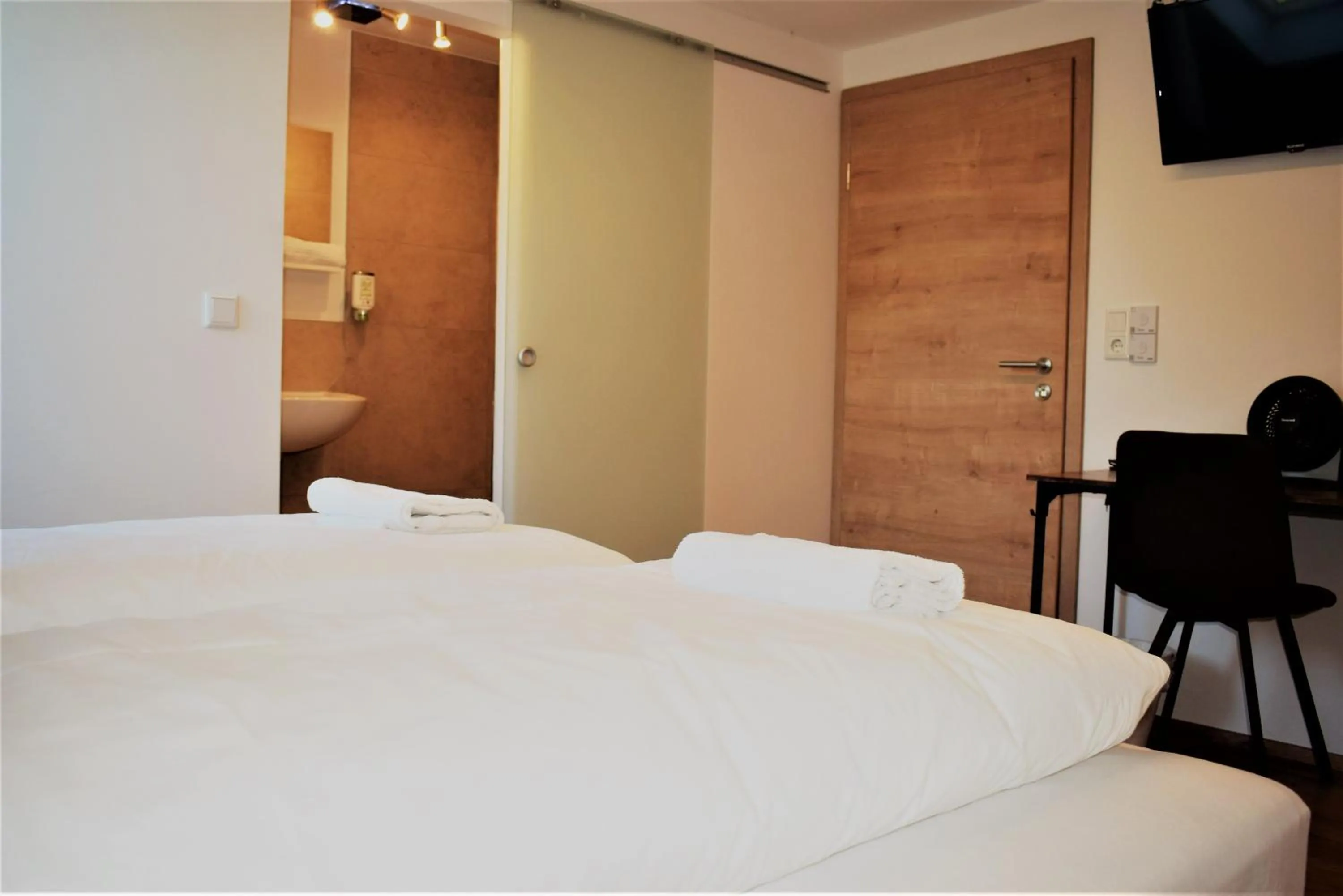 Photo of the whole room, Bed in Hotel Stanglbräu