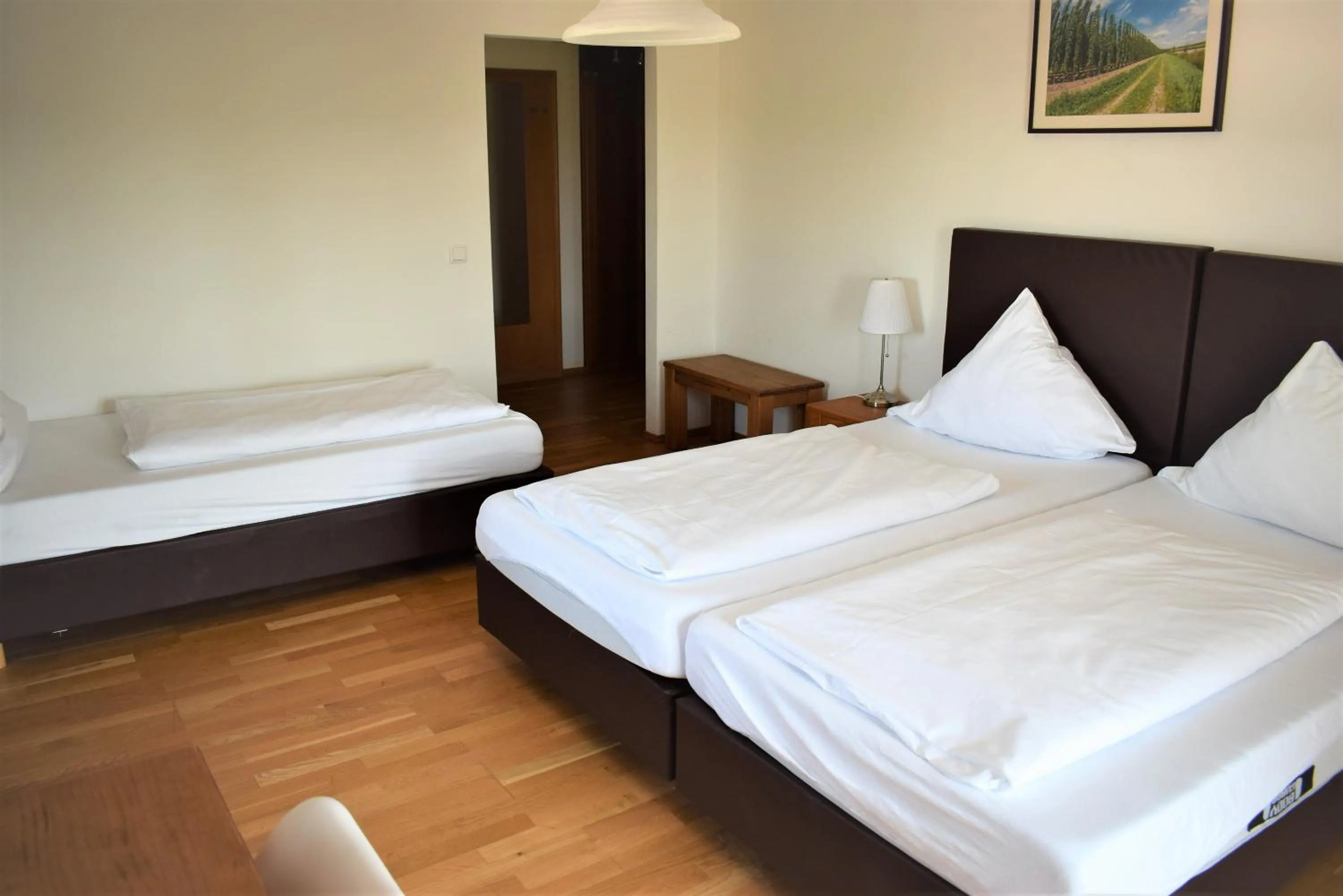 Photo of the whole room, Bed in Hotel Stanglbräu