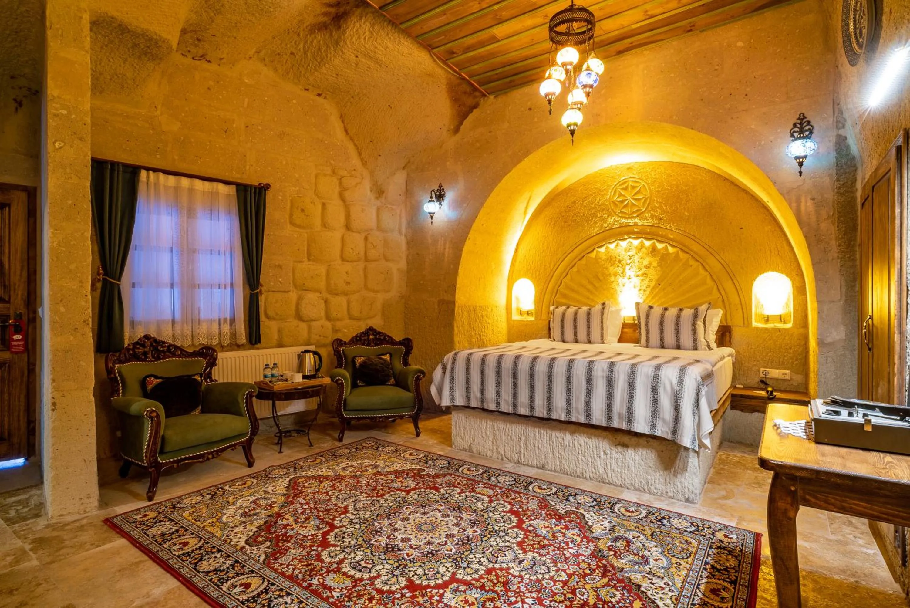 Bed in CAPPANAR CAVE HOTEL