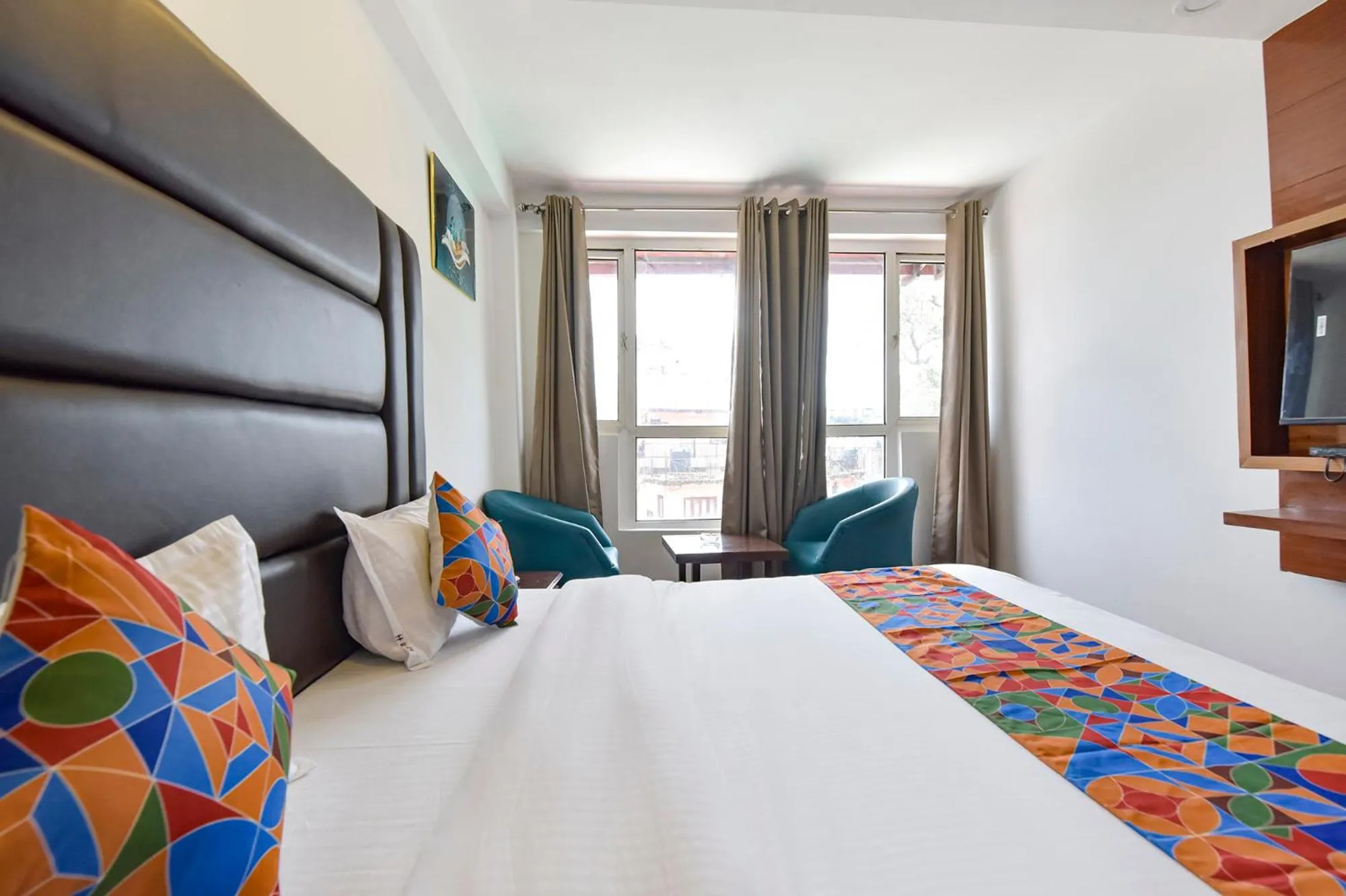 Bed in FabHotel Sikka Royal Classic - Mall road