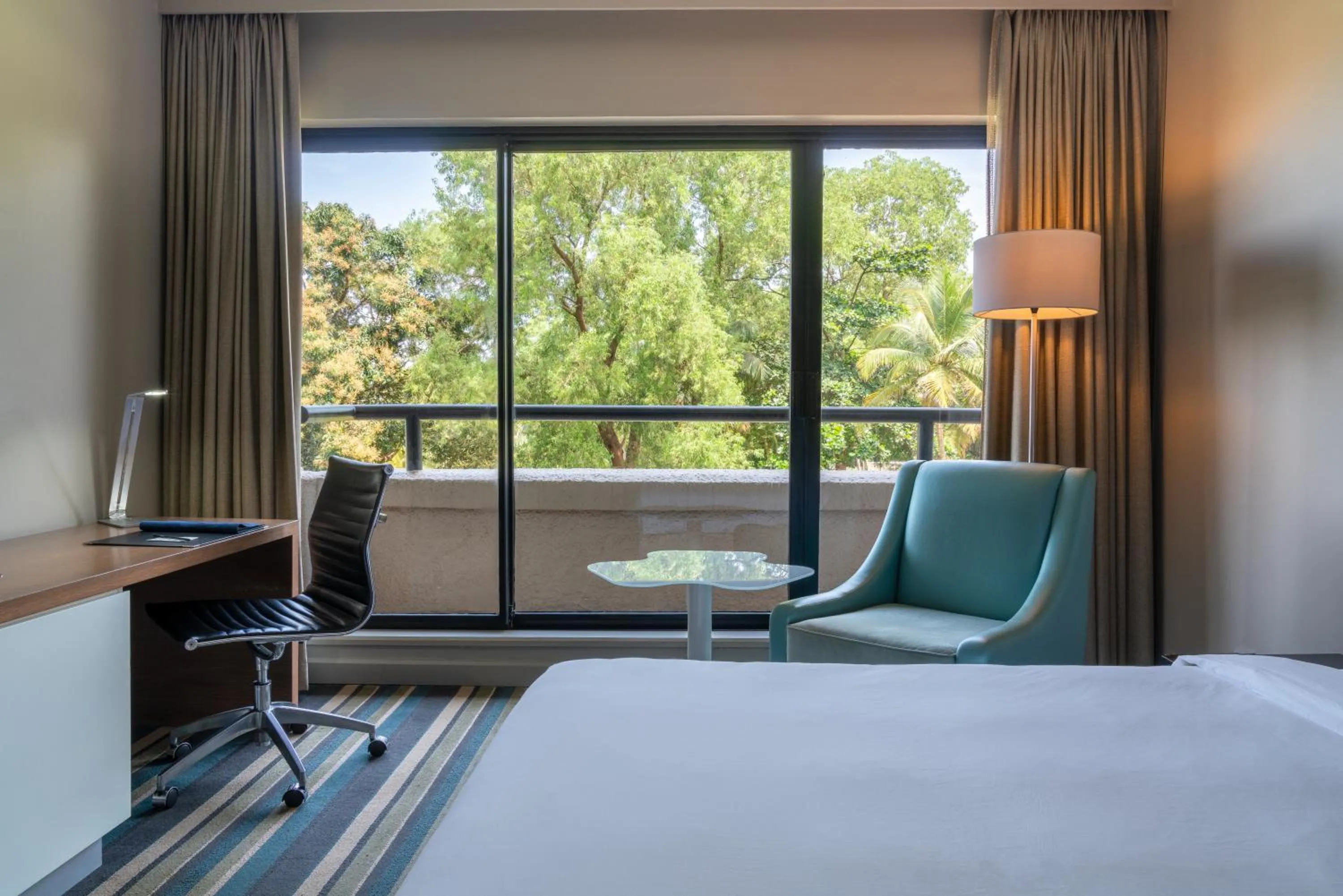 View (from property/room), Bed in Radisson Blu Mammy Yoko Hotel