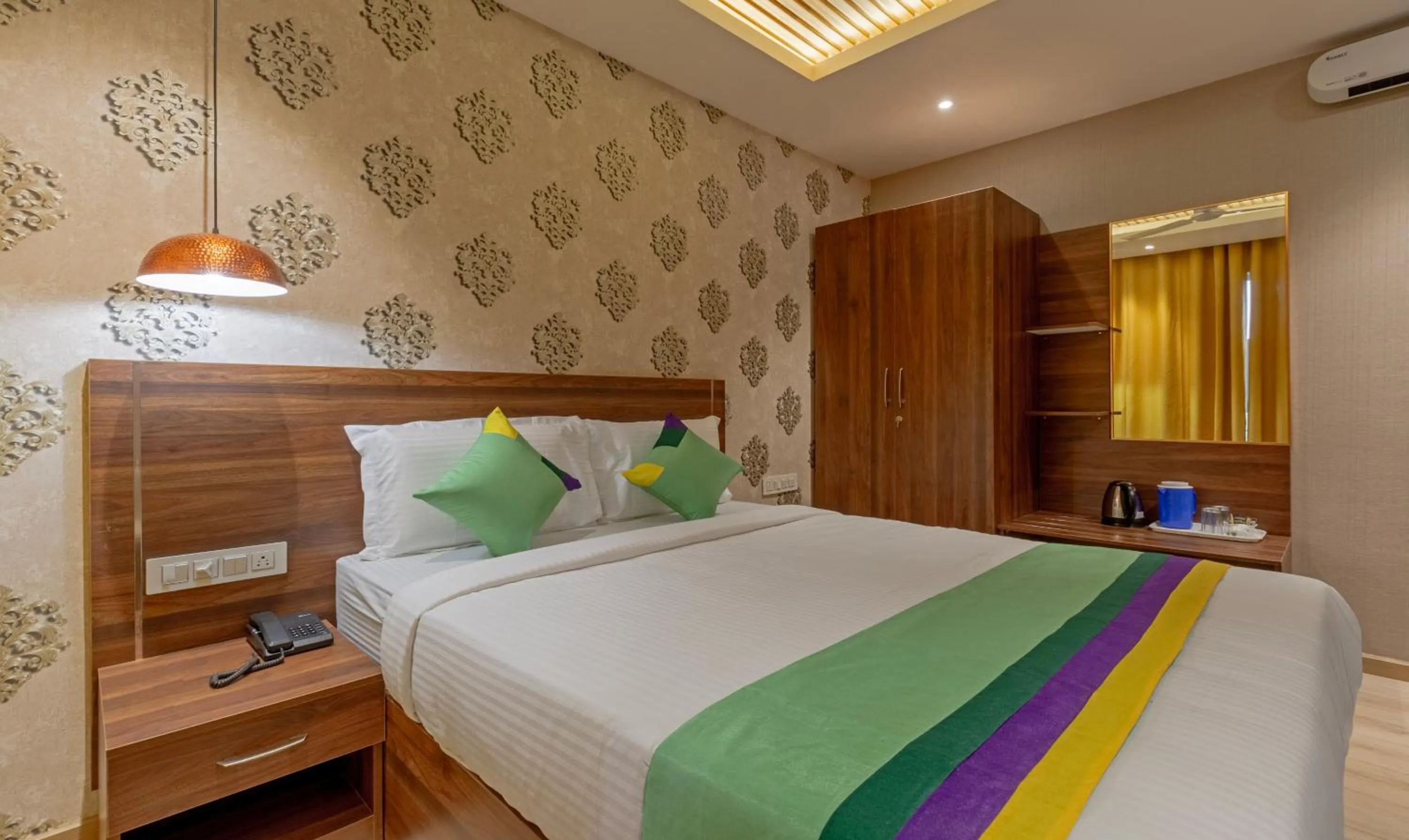 Bedroom, Bed in Treebo Windsor Heights