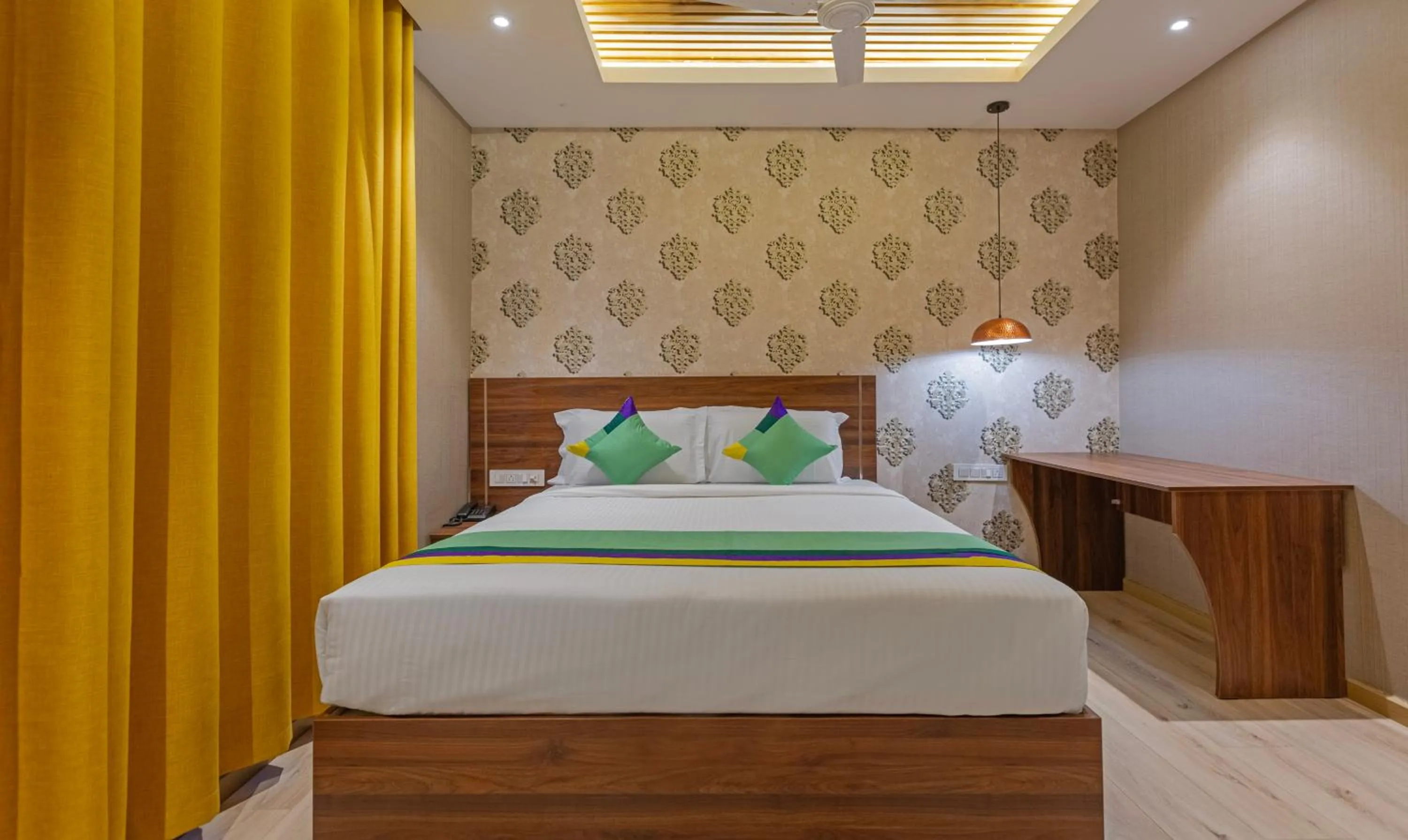 Bedroom, Bed in Treebo Windsor Heights