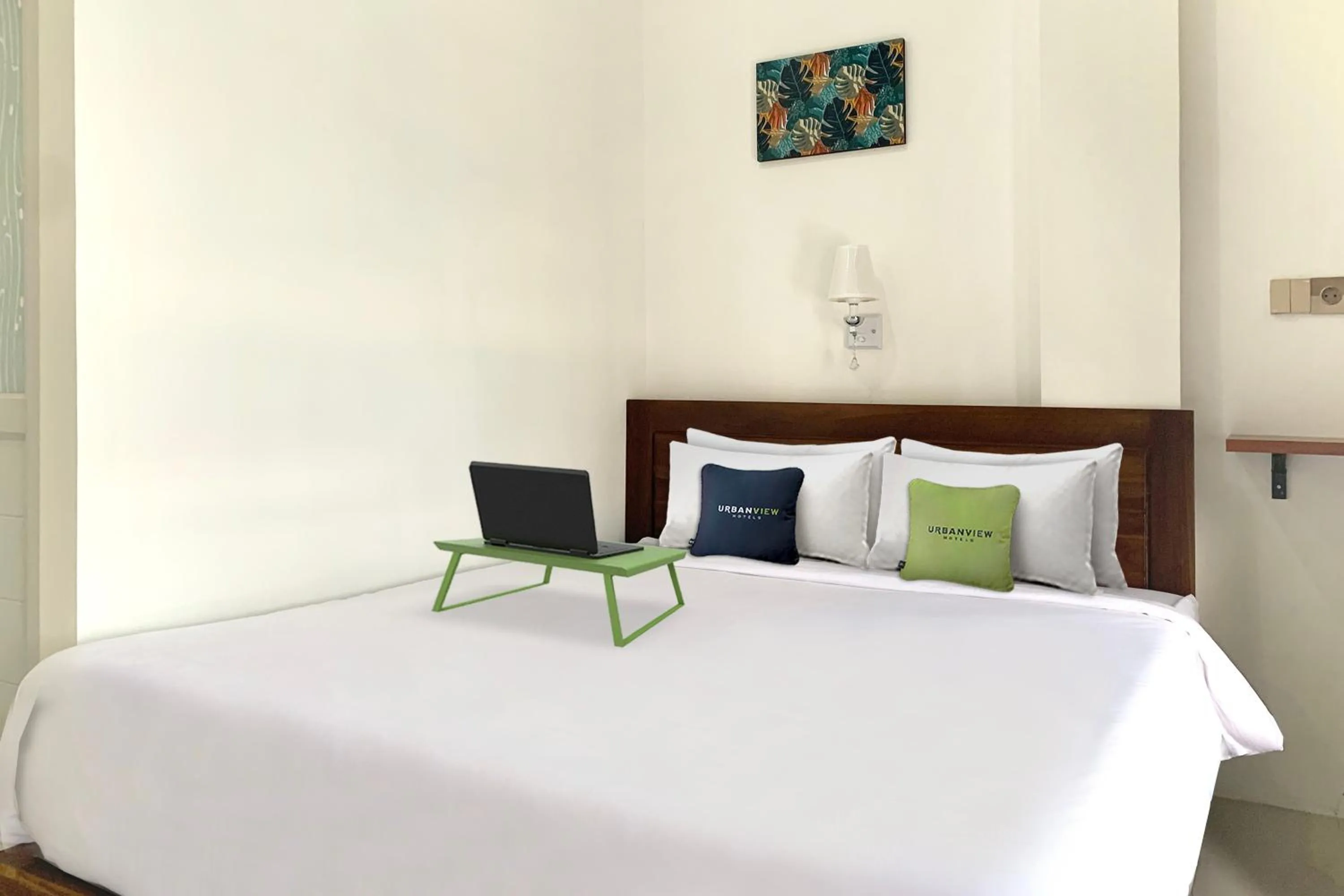 Bed in Urbanview Hotel SLIP Pringsewu by RedDoorz