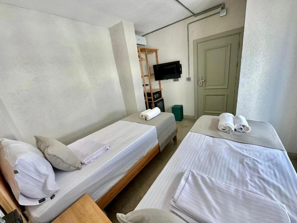 Bed in Elegance House Hotel