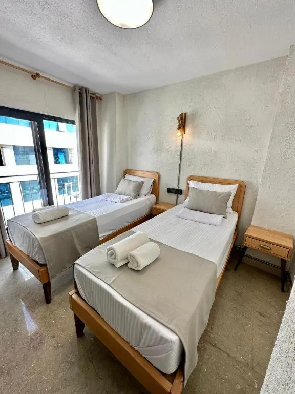 Bed in Elegance House Hotel