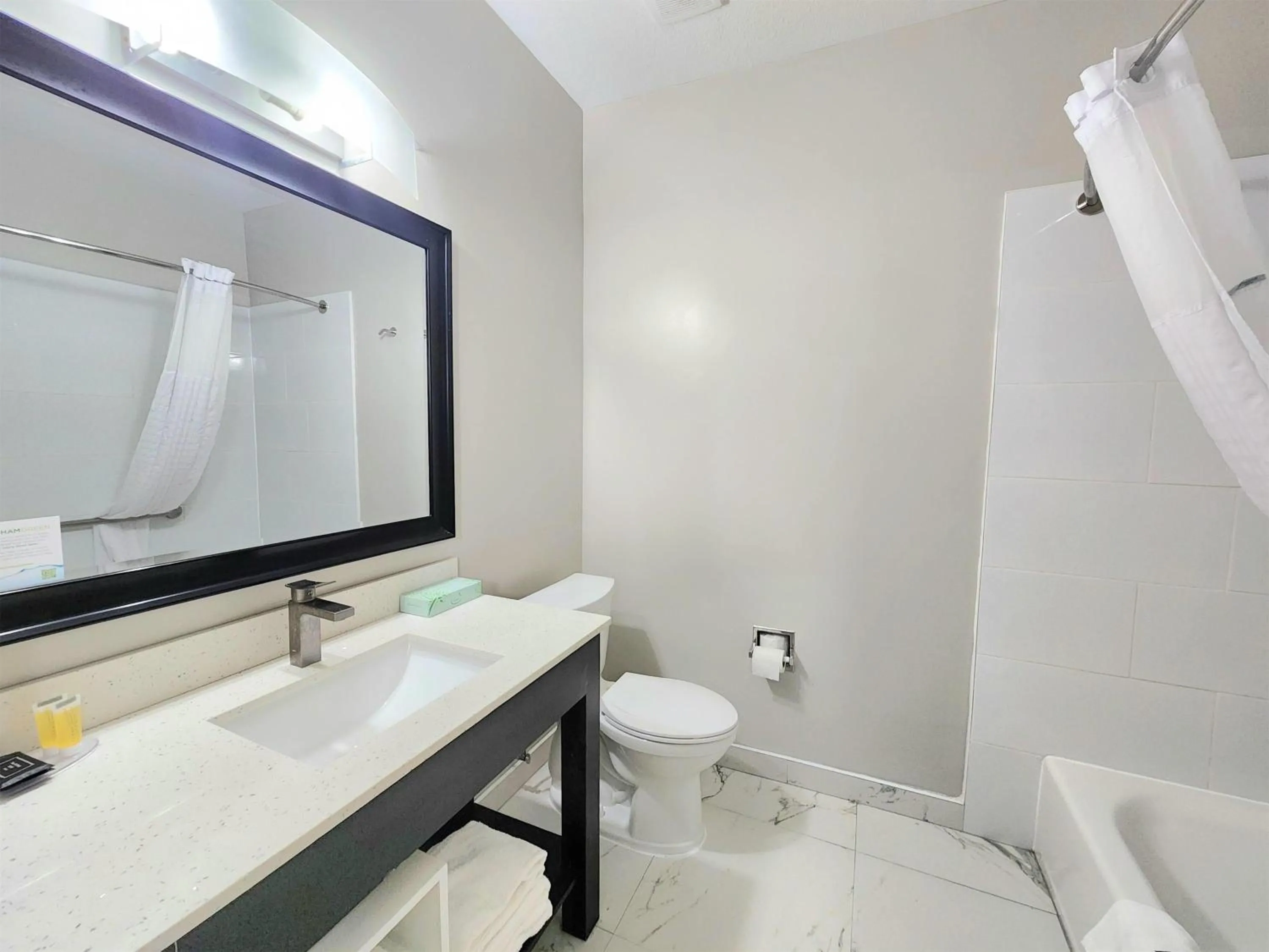 Bathroom in Days Inn & Suites by Wyndham Corpus Christi Central