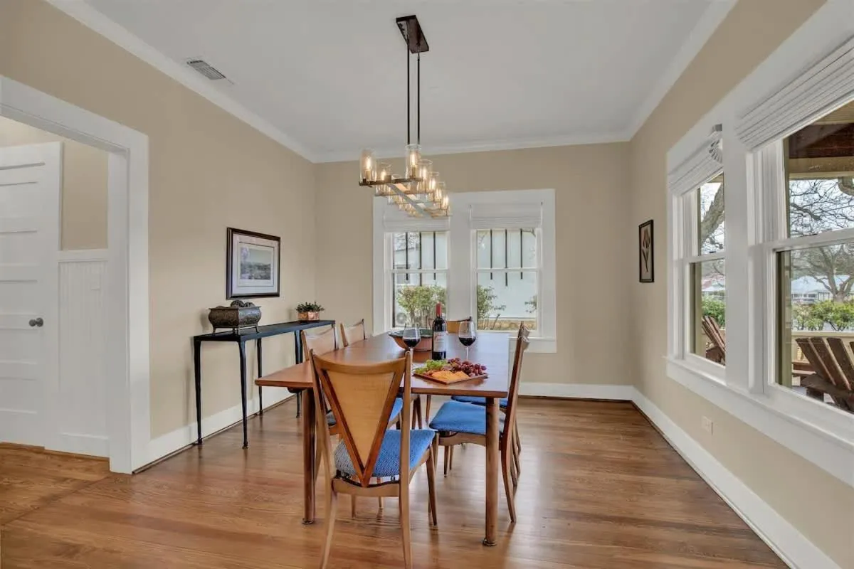 Dining area in Charming Craftsman Home!-2 BLKS from Main St!