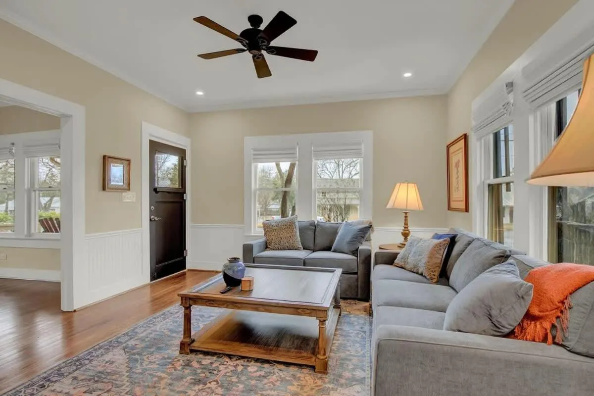 Living room in Charming Craftsman Home!-2 BLKS from Main St!