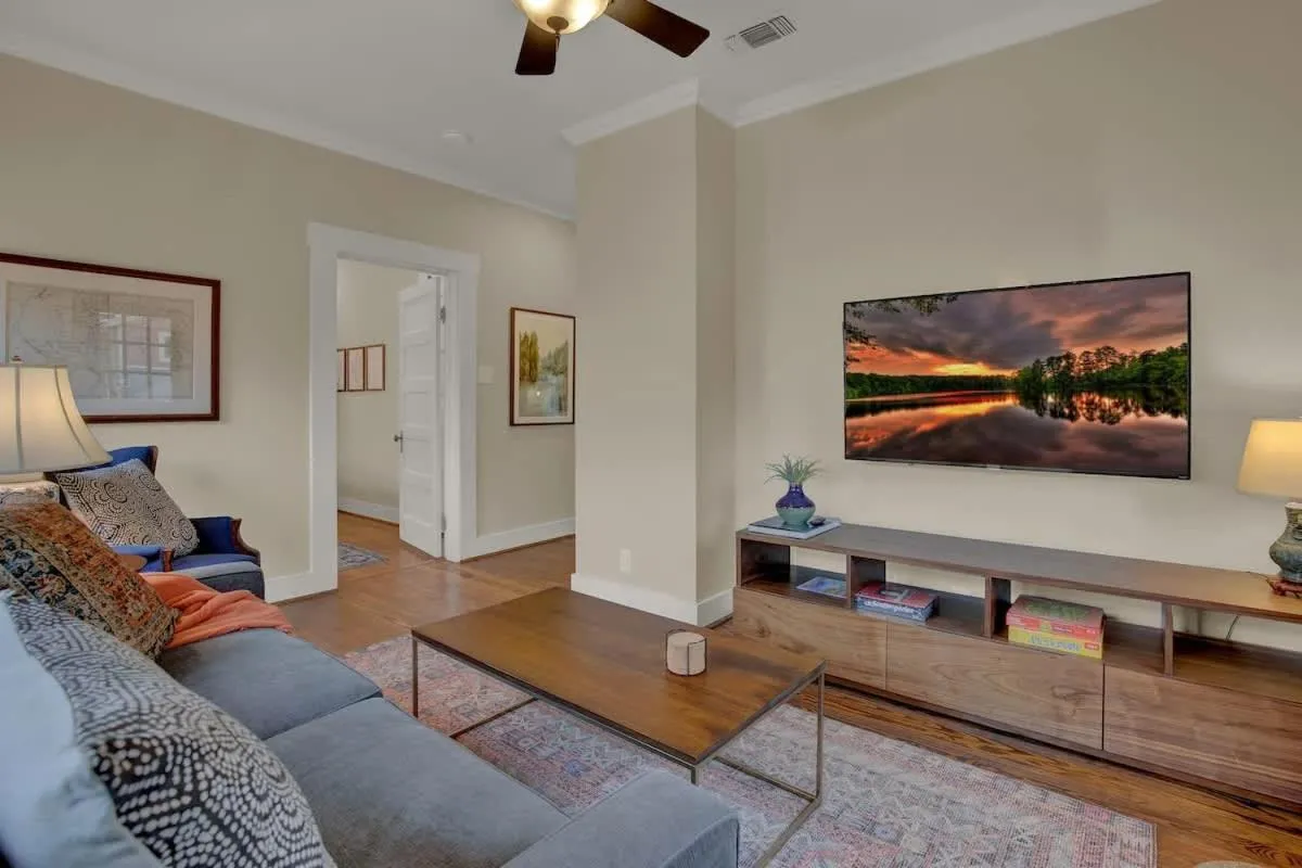 Living room in Charming Craftsman Home!-2 BLKS from Main St!