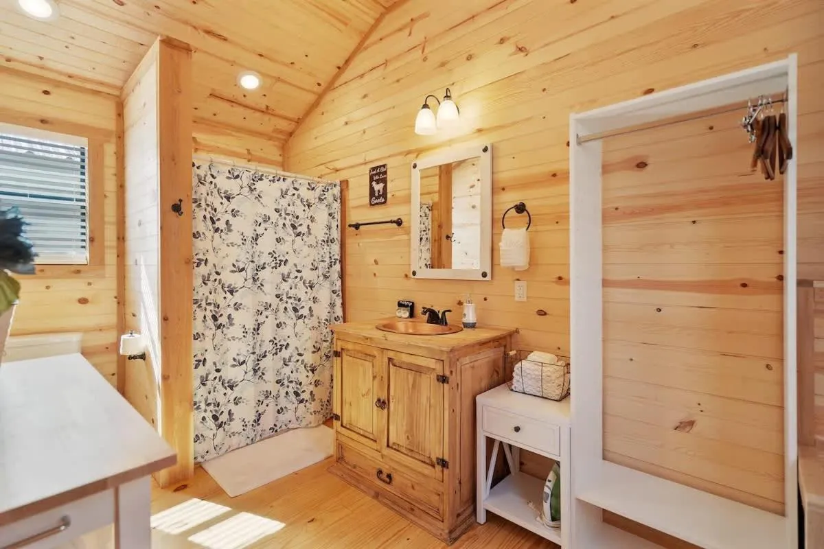 Bathroom in Stunning Cabin Right on Main St!