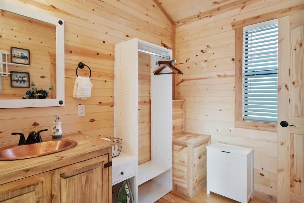 Bathroom in Stunning Cabin Right on Main St!