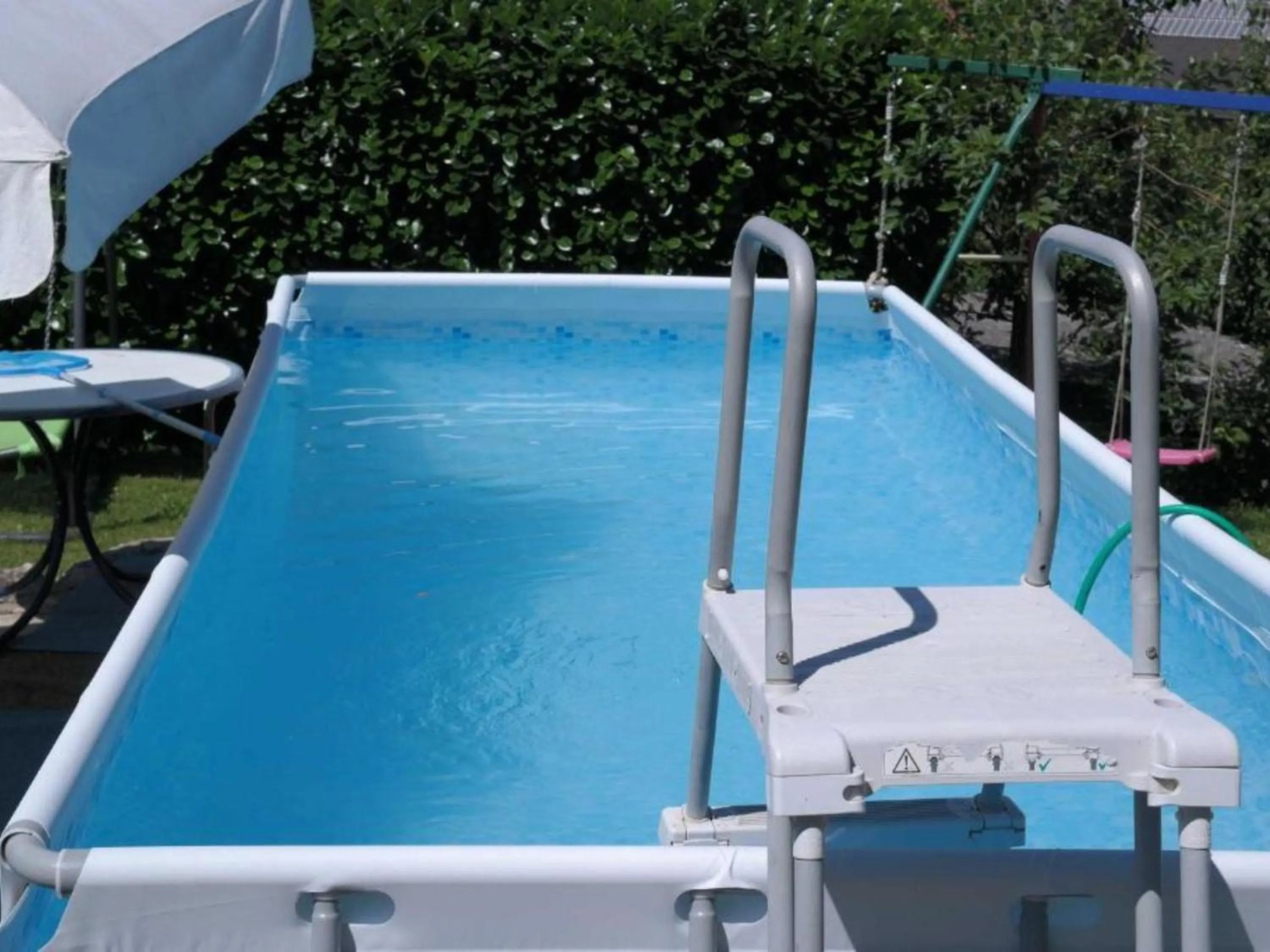 Swimming pool in Ferienwohnungen Maierhof Oberried