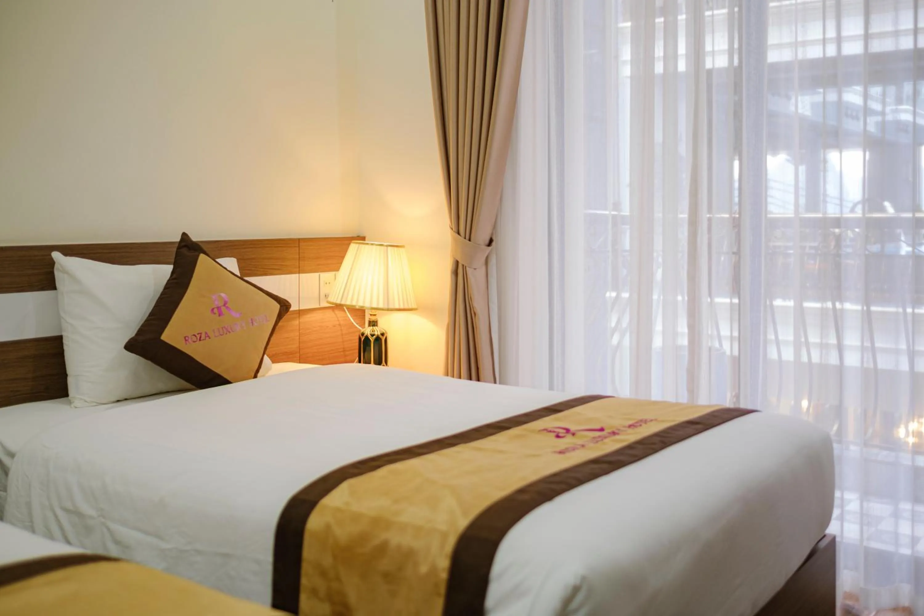 Bed in Roza Palace Cat Ba